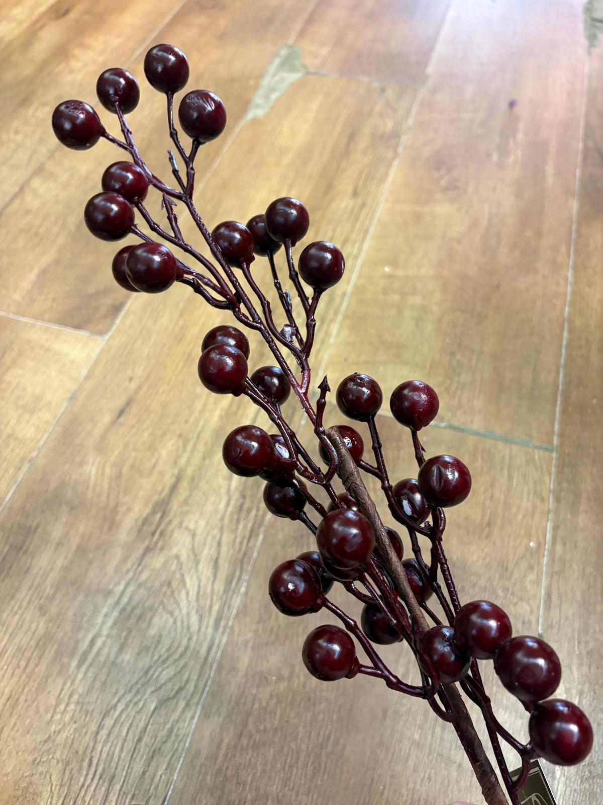 Long stem deep burgundy berry spray