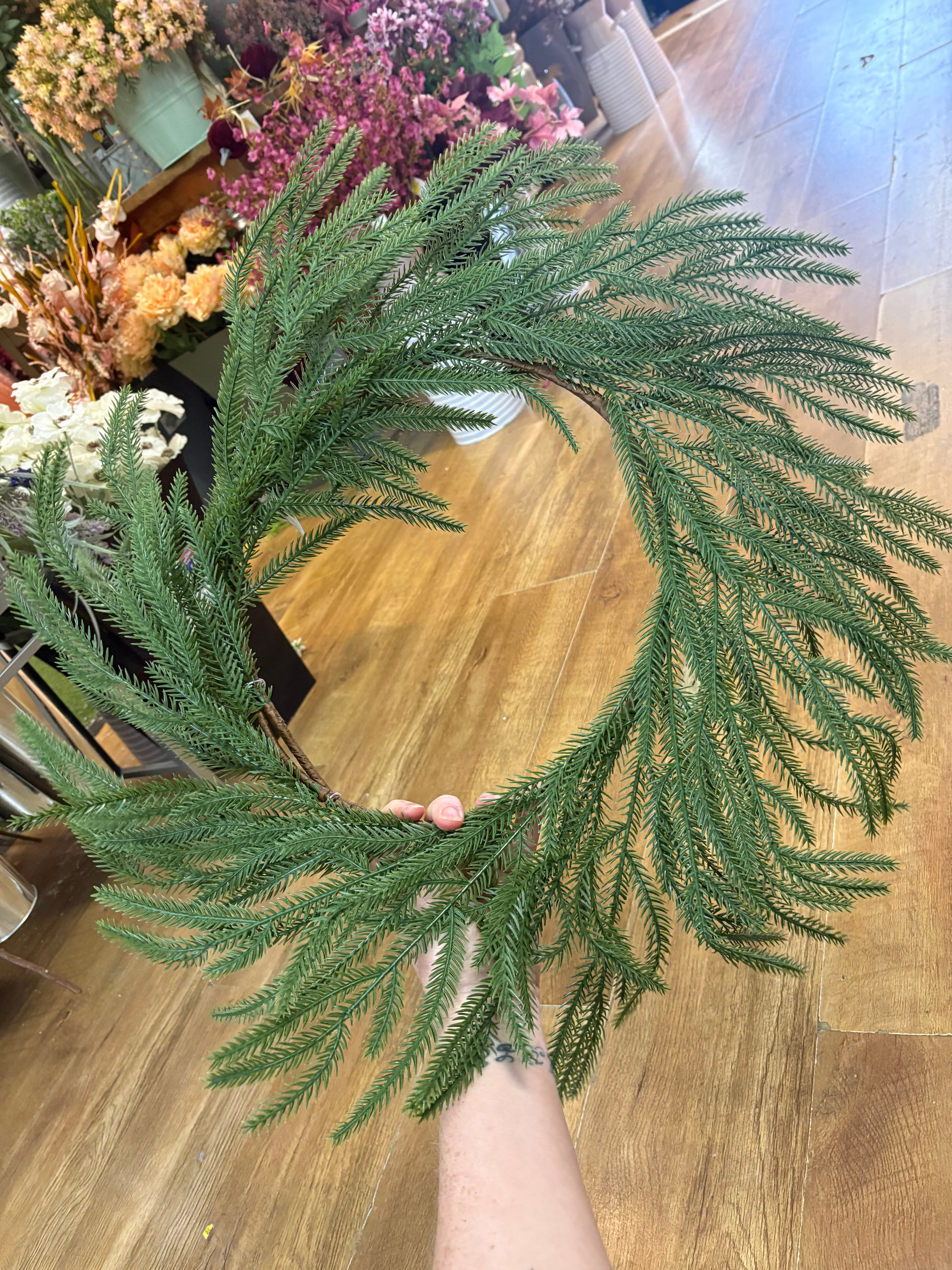 55cm trailing fir wreath (measured tip to tip)