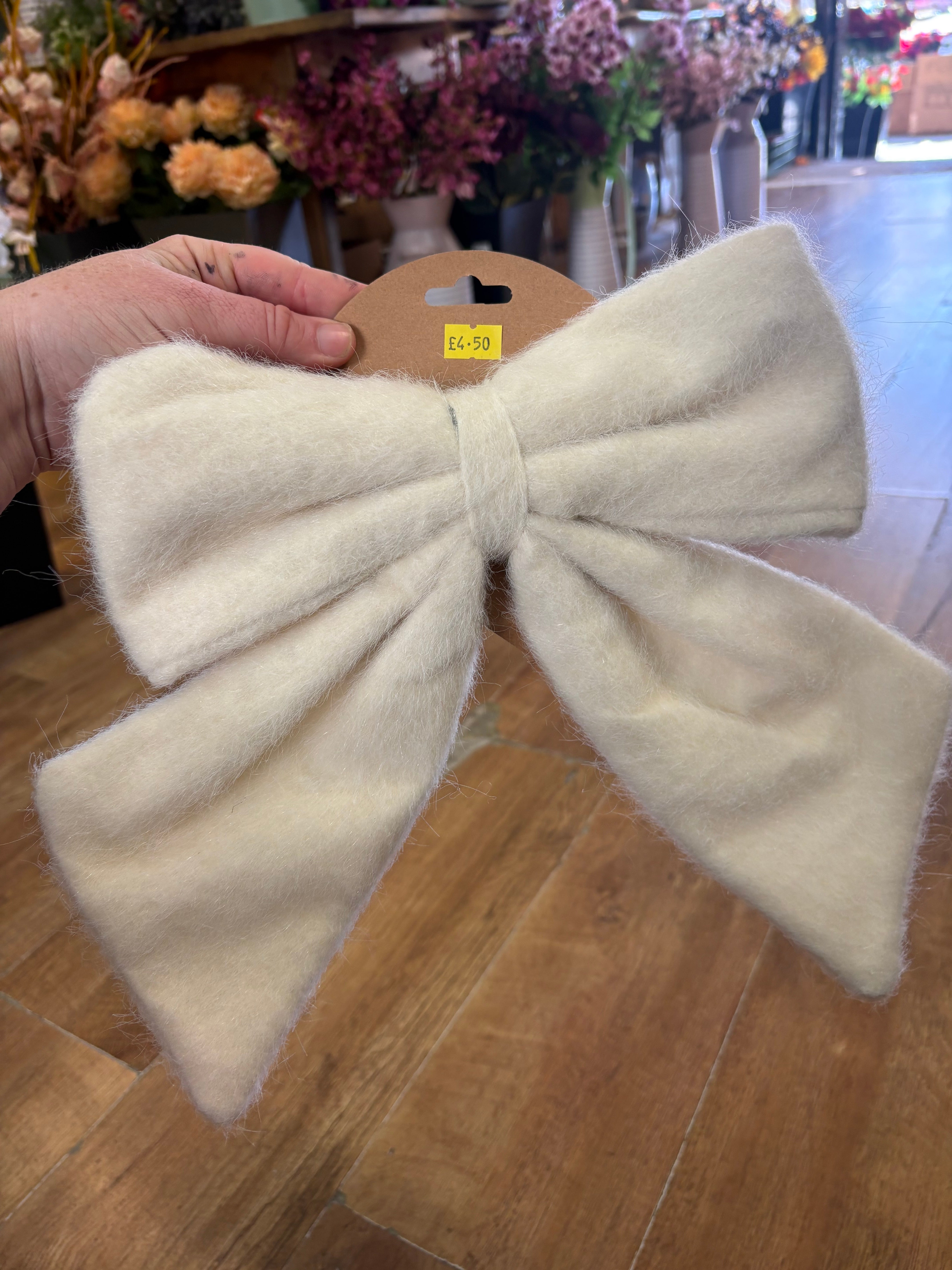 Medium cream fleece Christmas bow