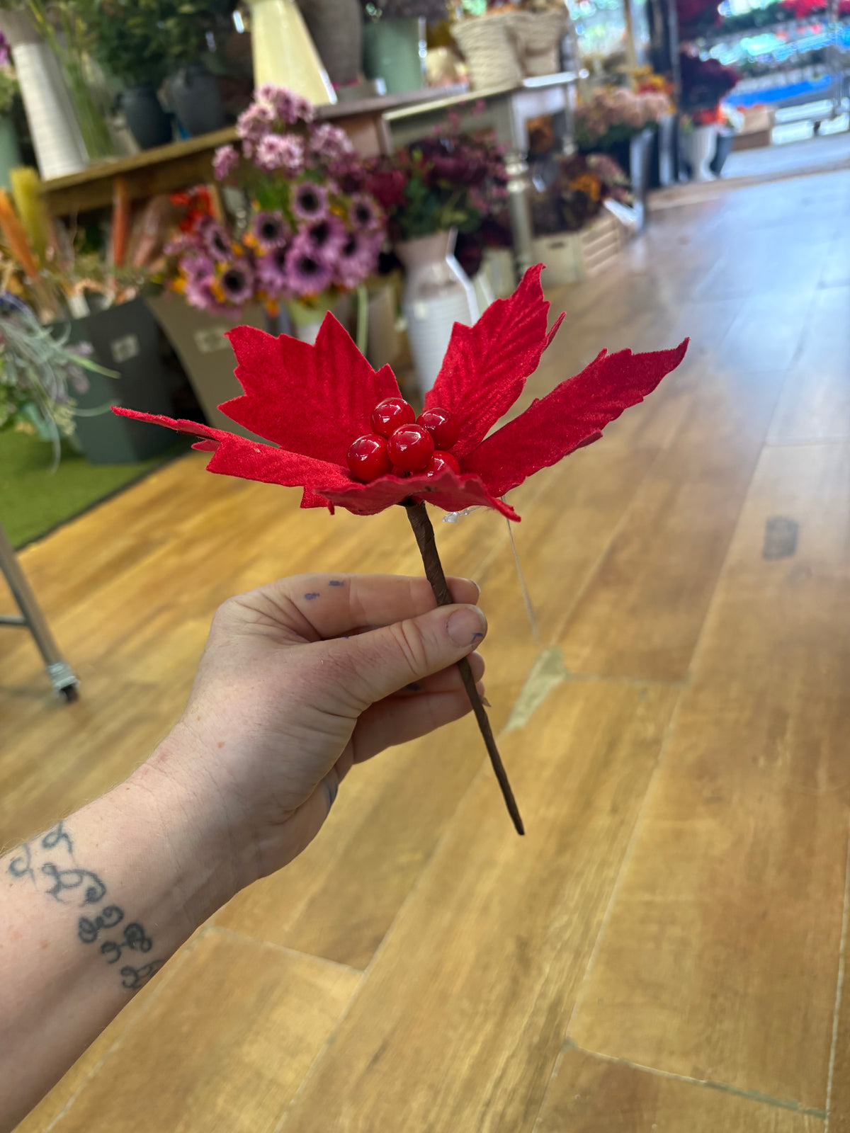 Small red velvet poinsettia pick