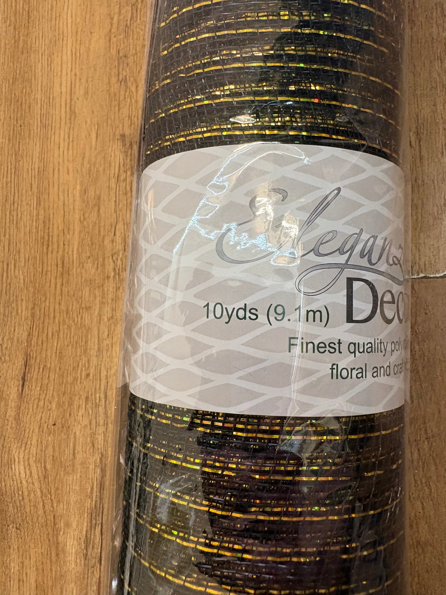 53xm x 9.1m (10 yrds) metallic black and gold deco mesh