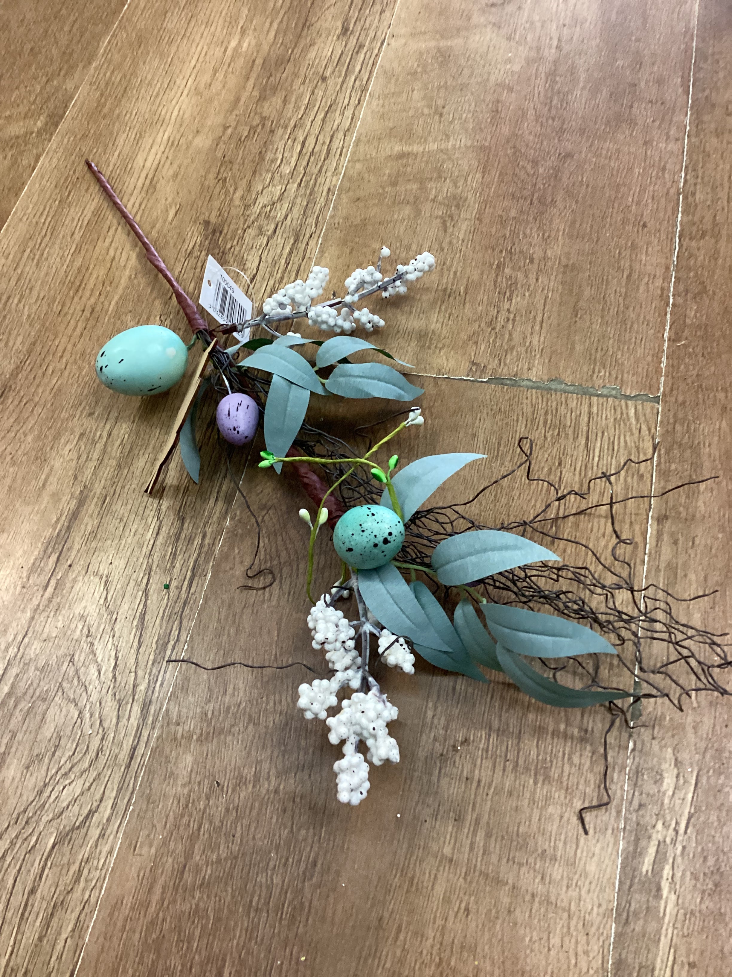 Wooden rabbit and Easter stem