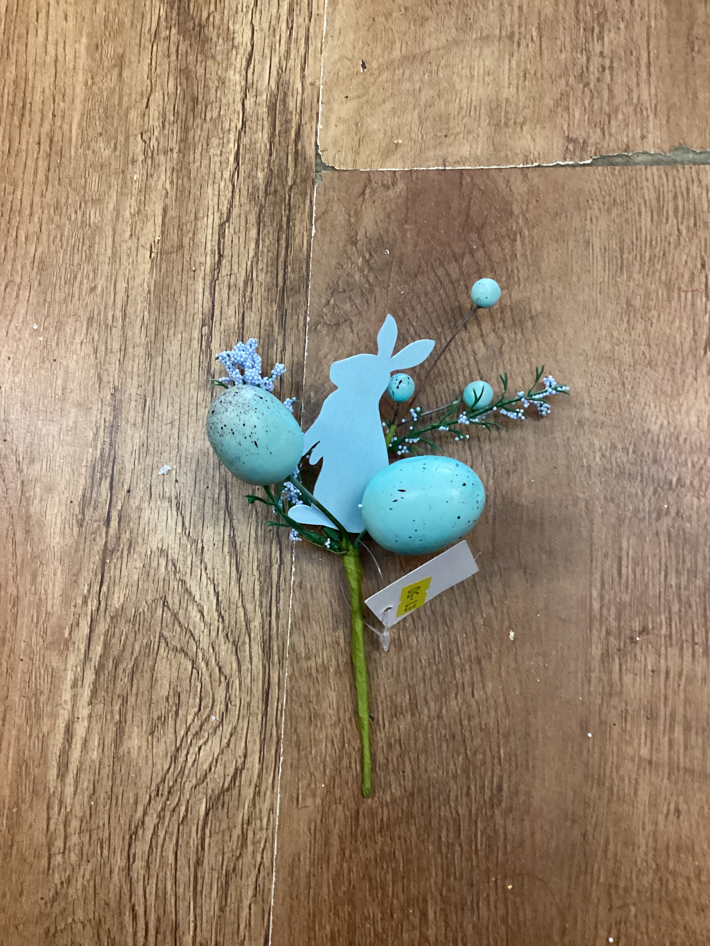 Blue wooden rabbit and Easter egg pick