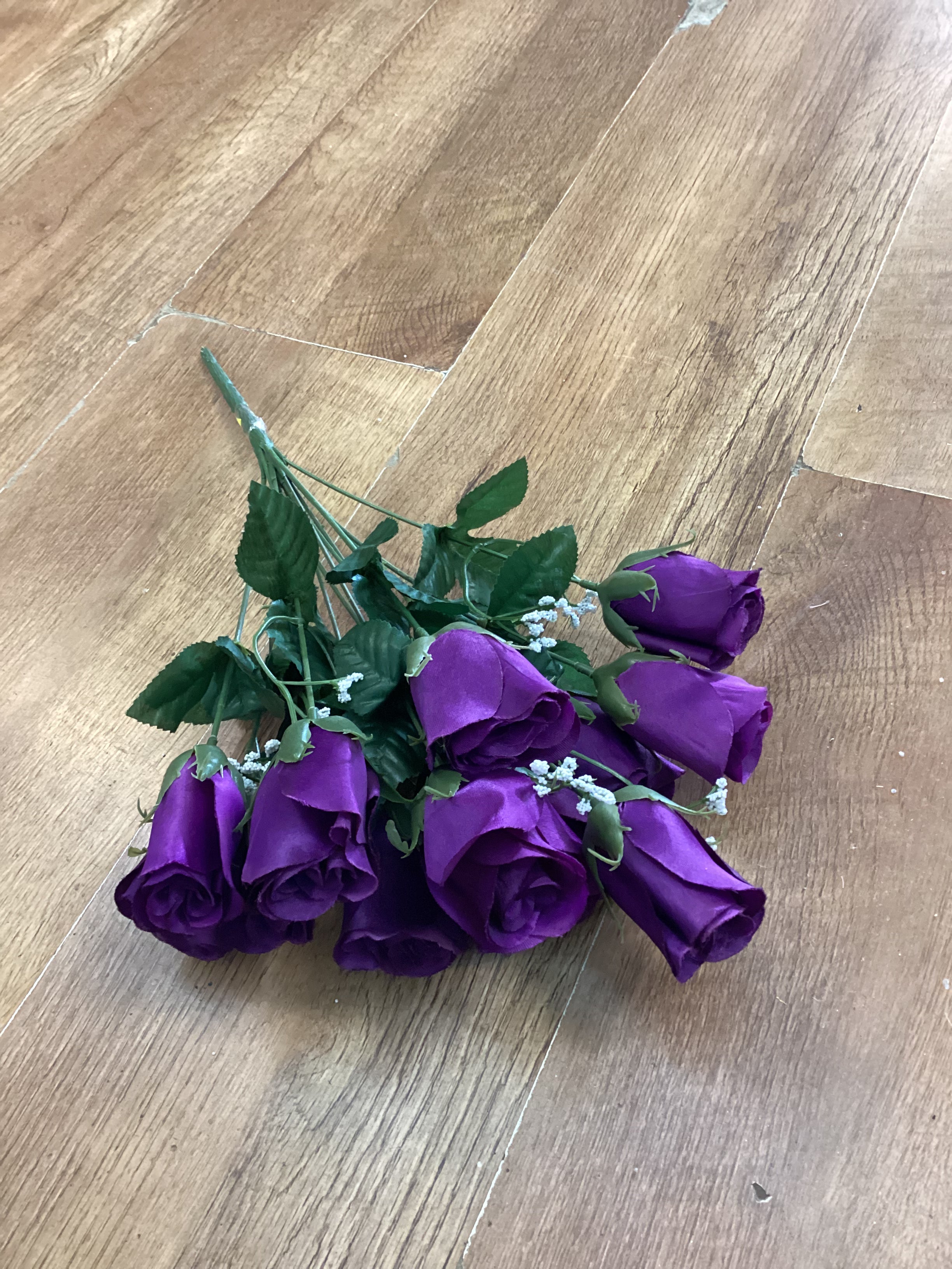 Big bunch of purple rose with gypsophila