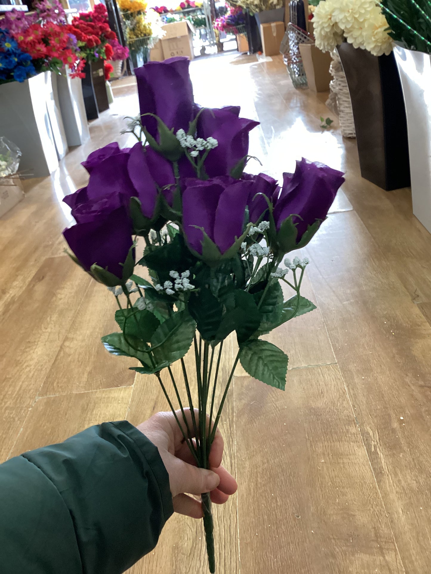 Big bunch of purple rose with gypsophila