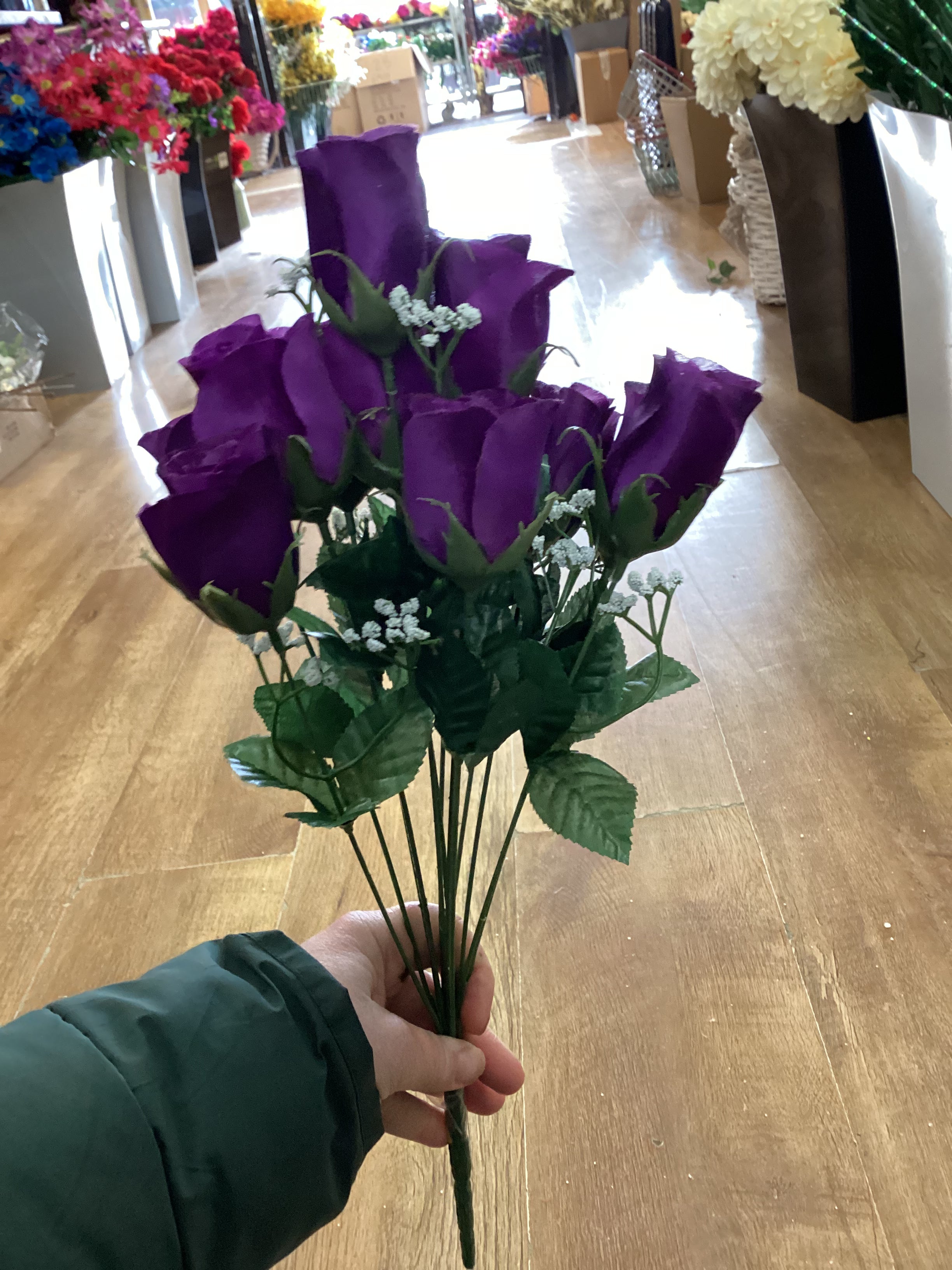 Big bunch of purple rose with gypsophila