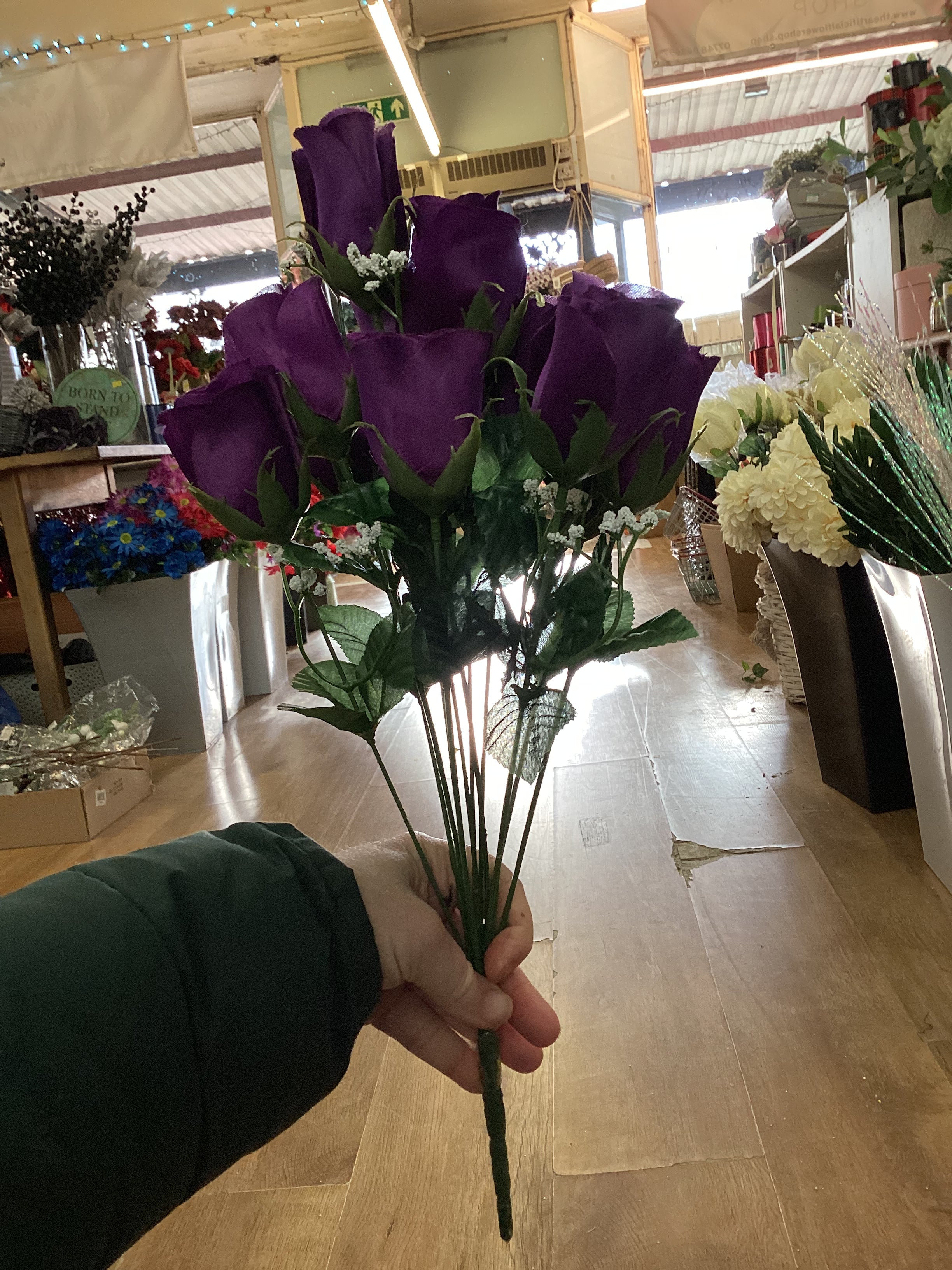 Big bunch of purple rose with gypsophila