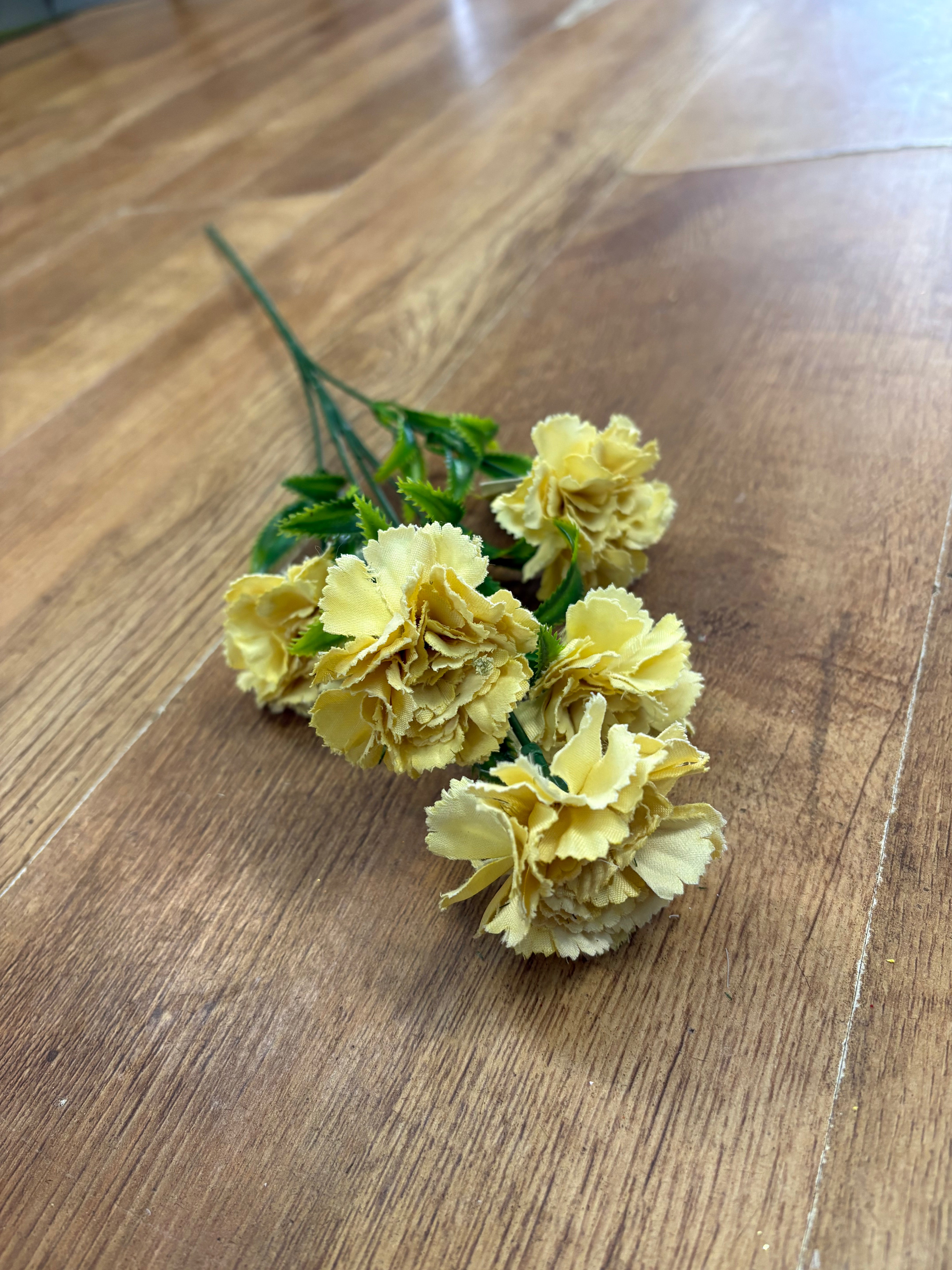 Long stem yellow carnations