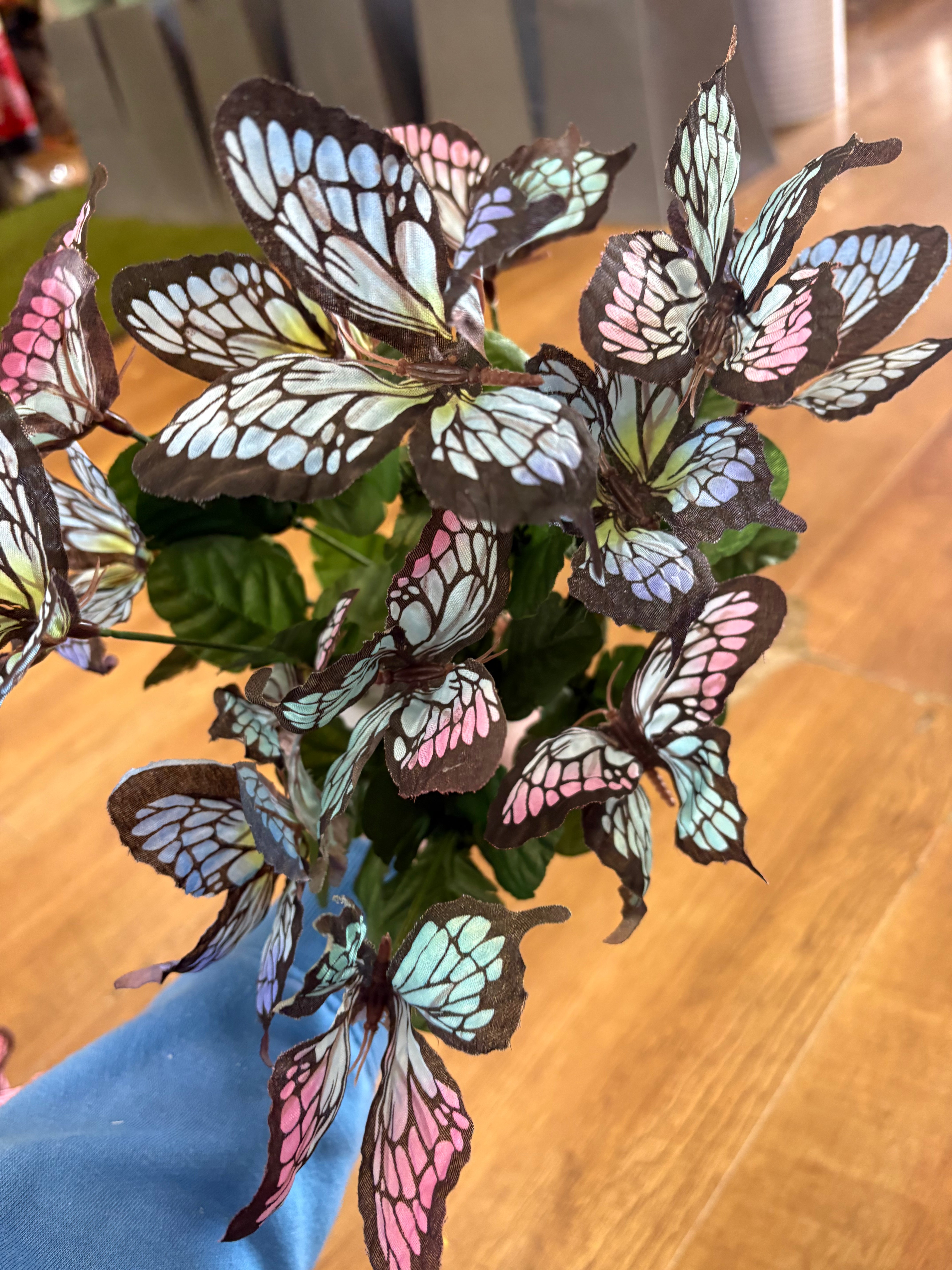Big bunch of pale blue and pink butterflies