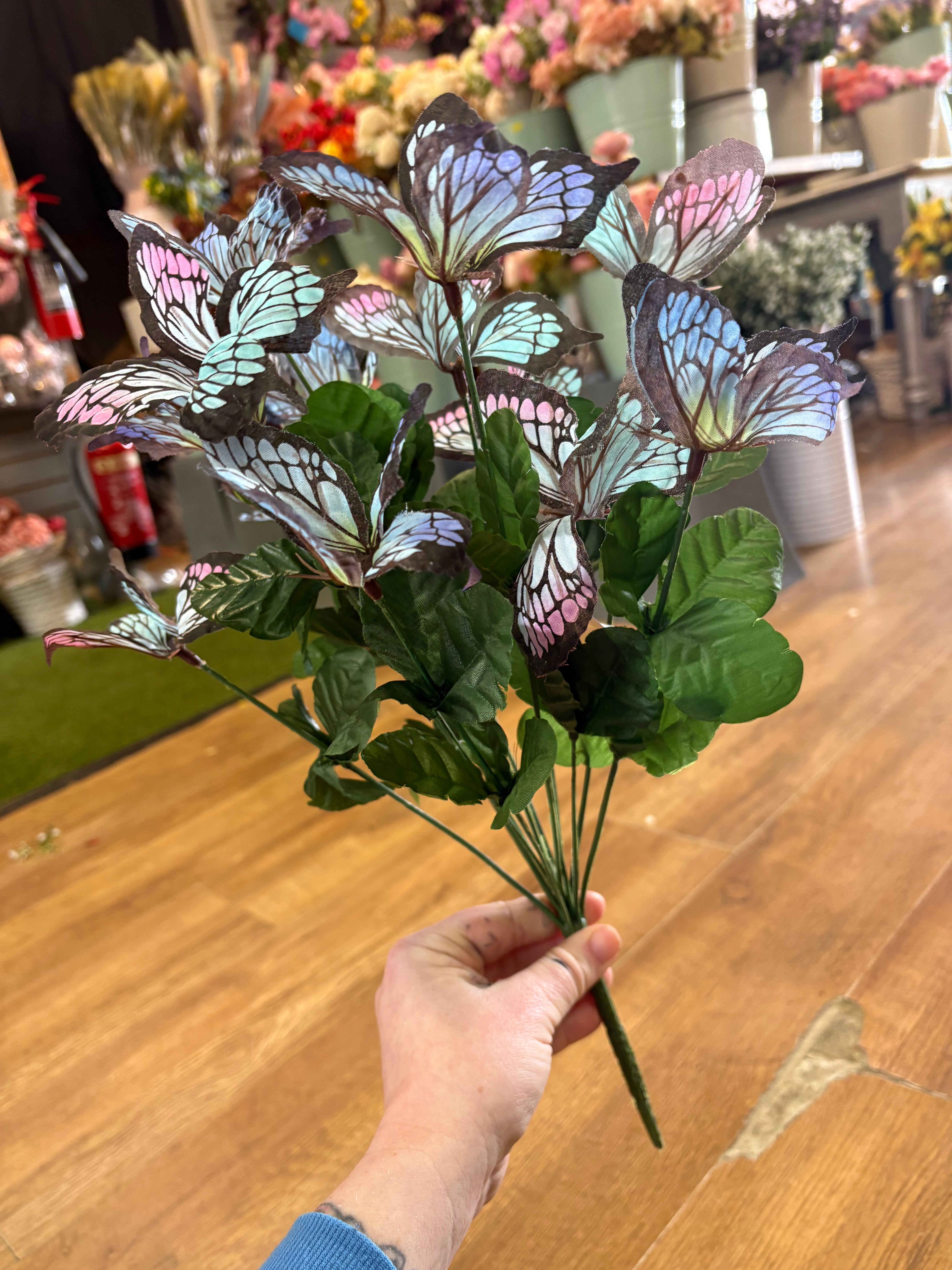 Big bunch of pale blue and pink butterflies
