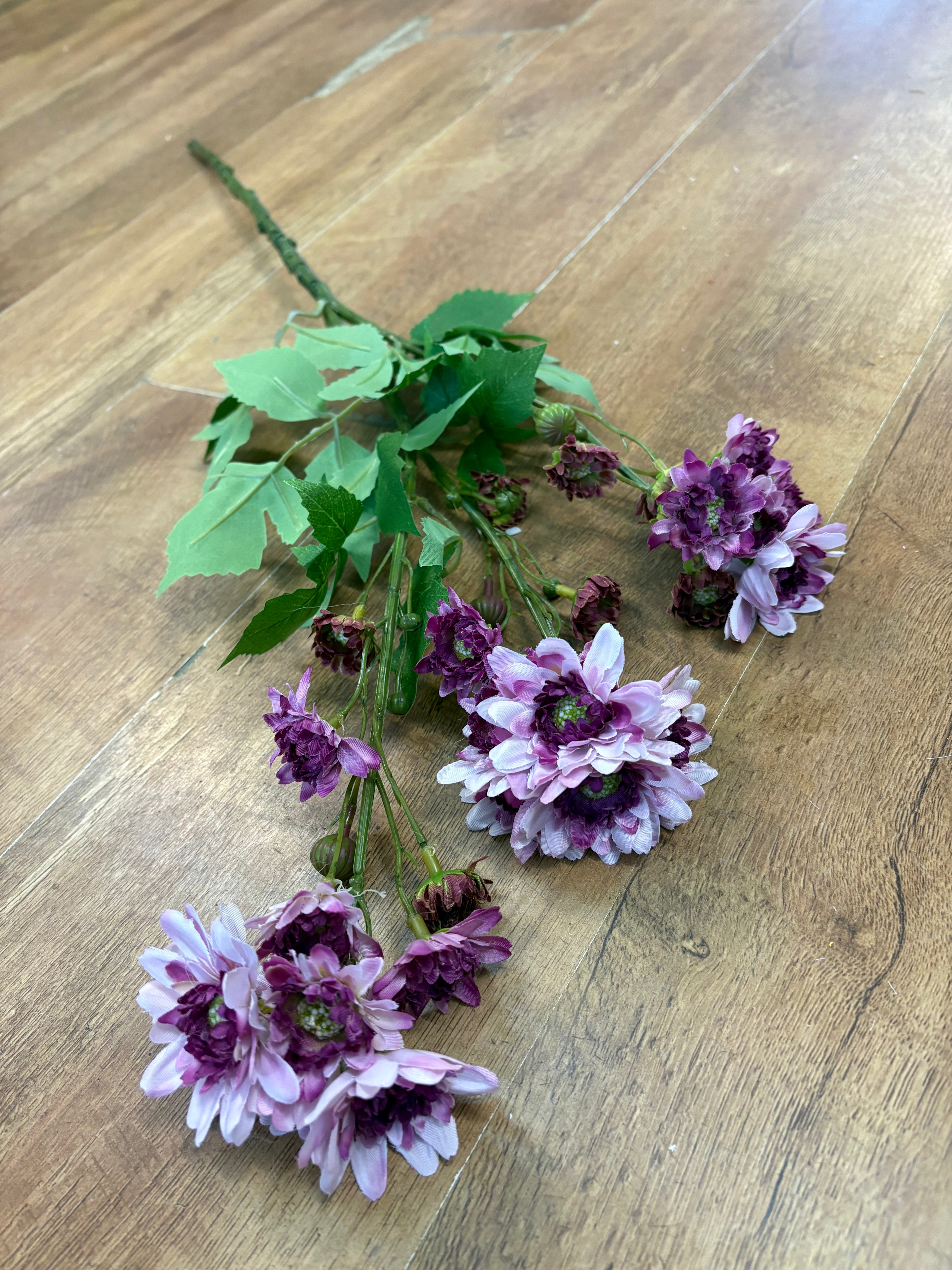 Long stem realistic mixed lilac and magenta traditional chrysanthemum spray