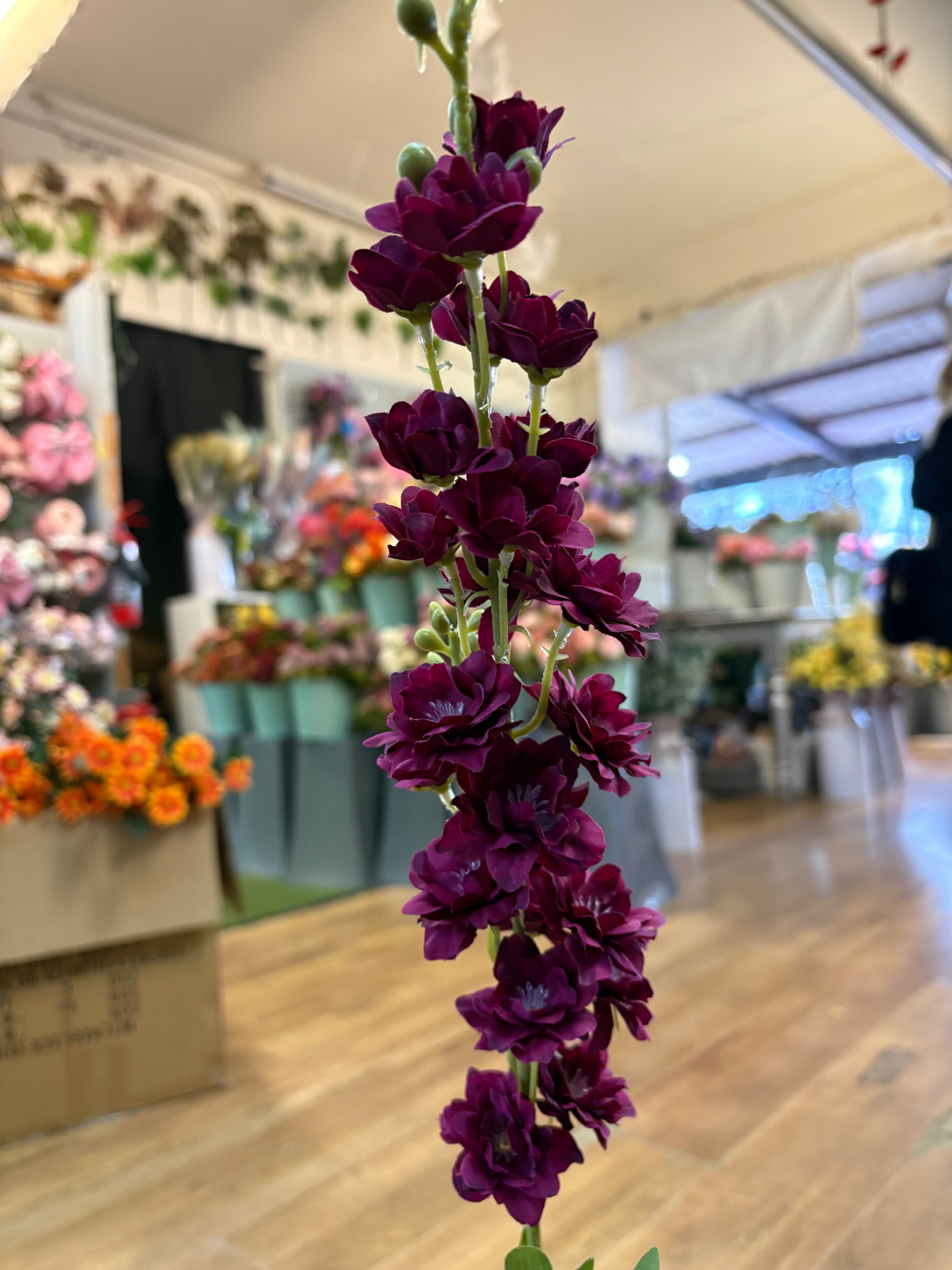 Long stem deep magenta stock flower