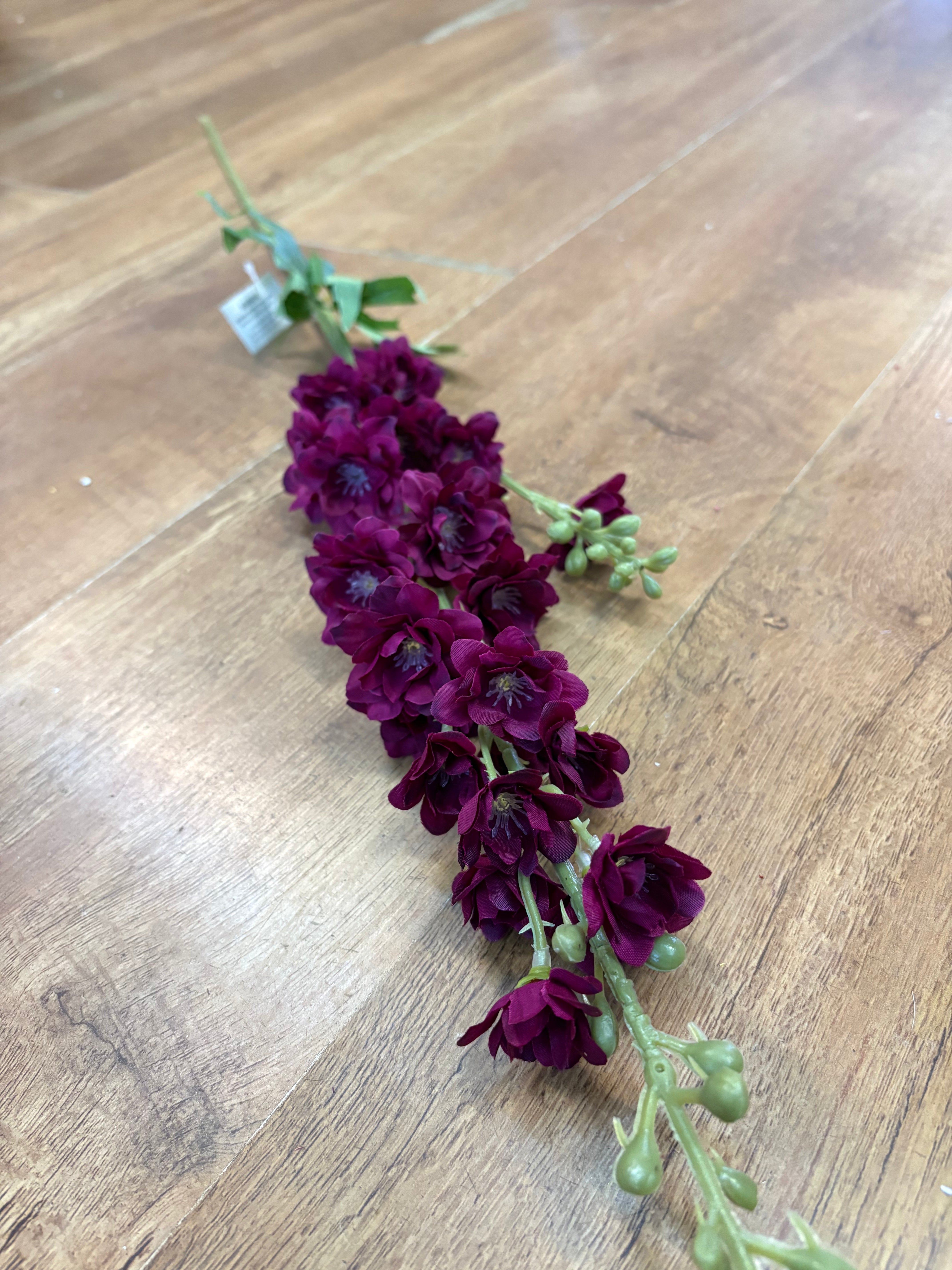 Long stem deep magenta stock flower