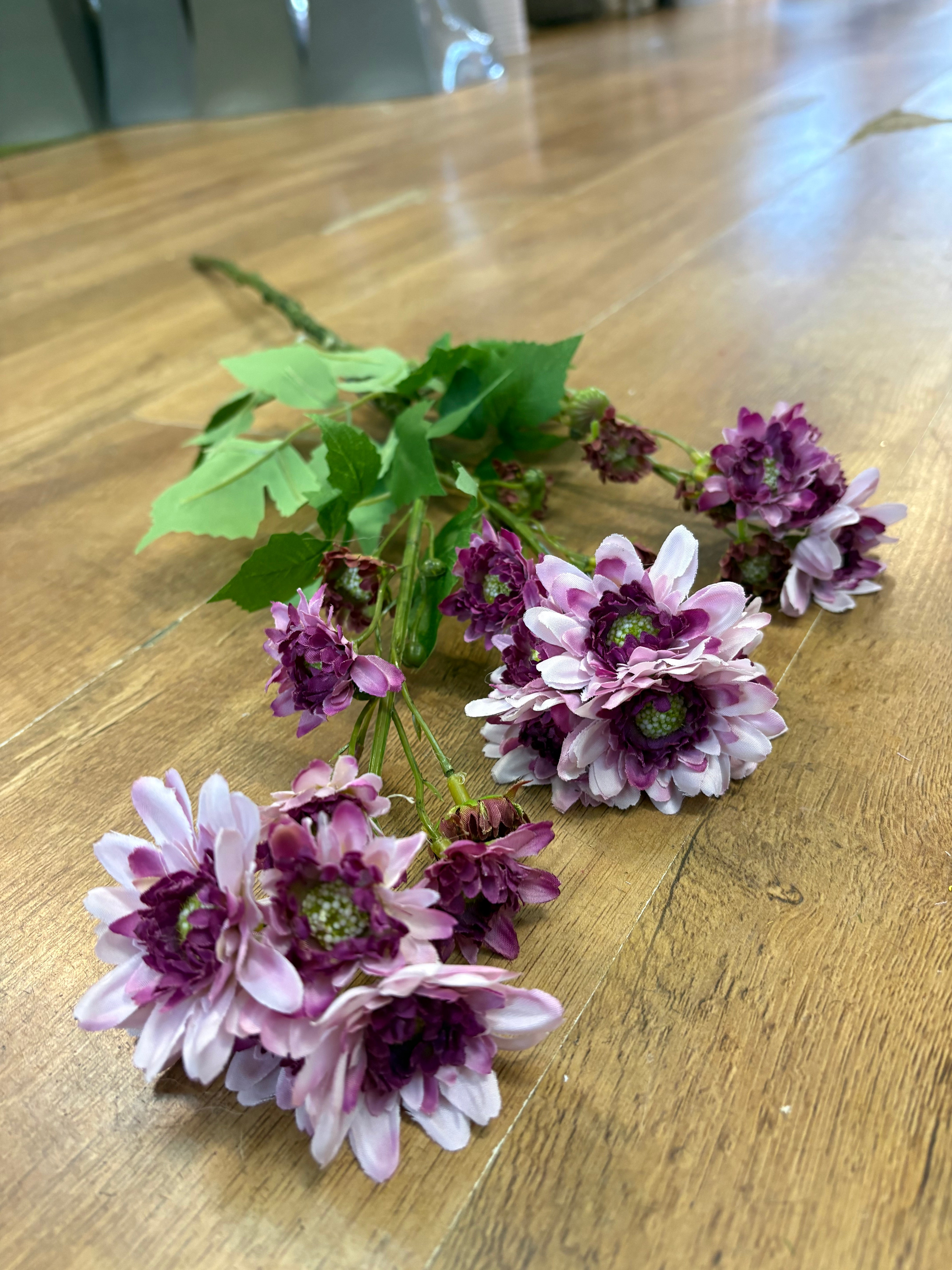 Long stem realistic mixed lilac and magenta traditional chrysanthemum spray