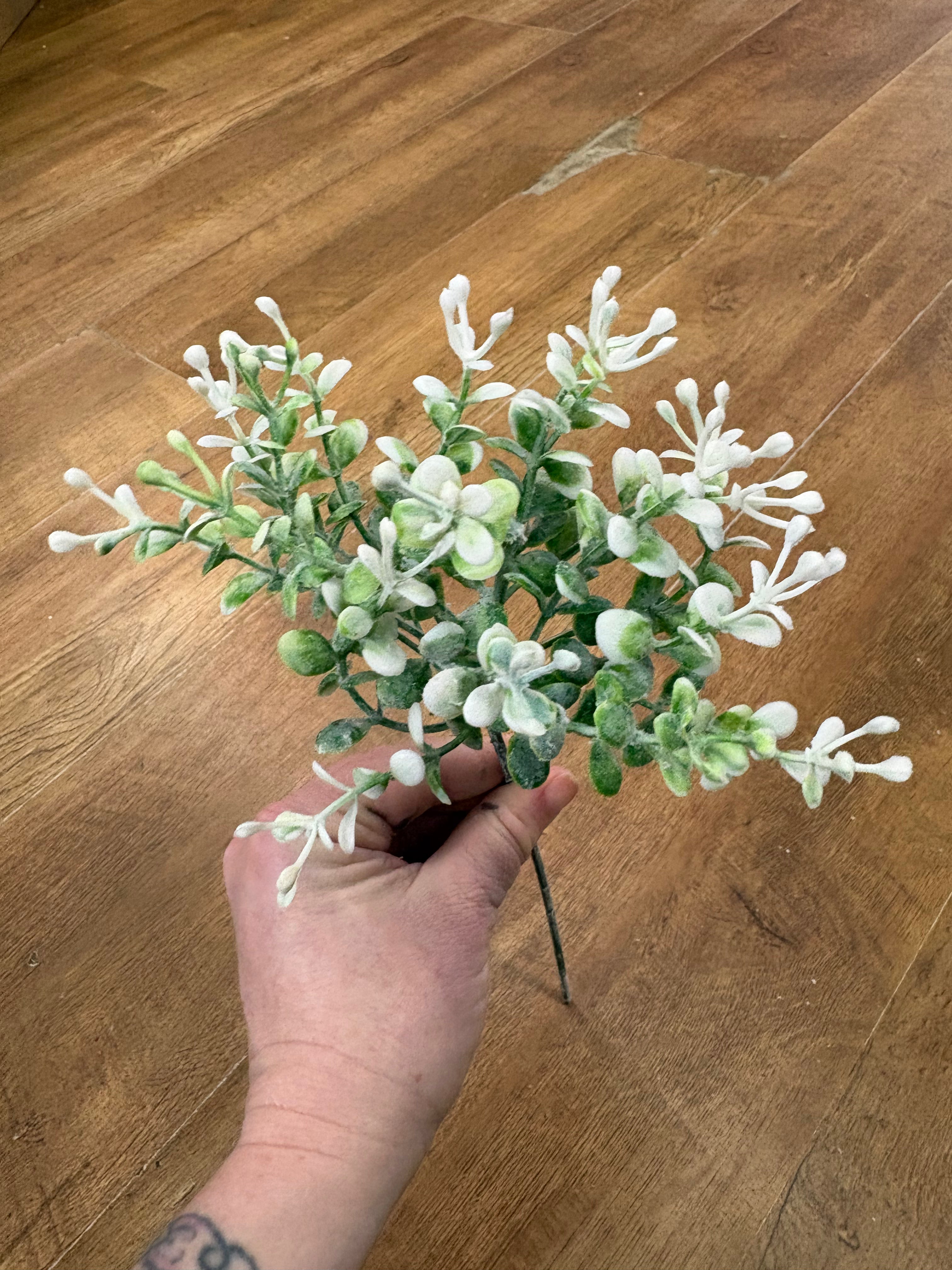 Flocked white dotty sprig pick
