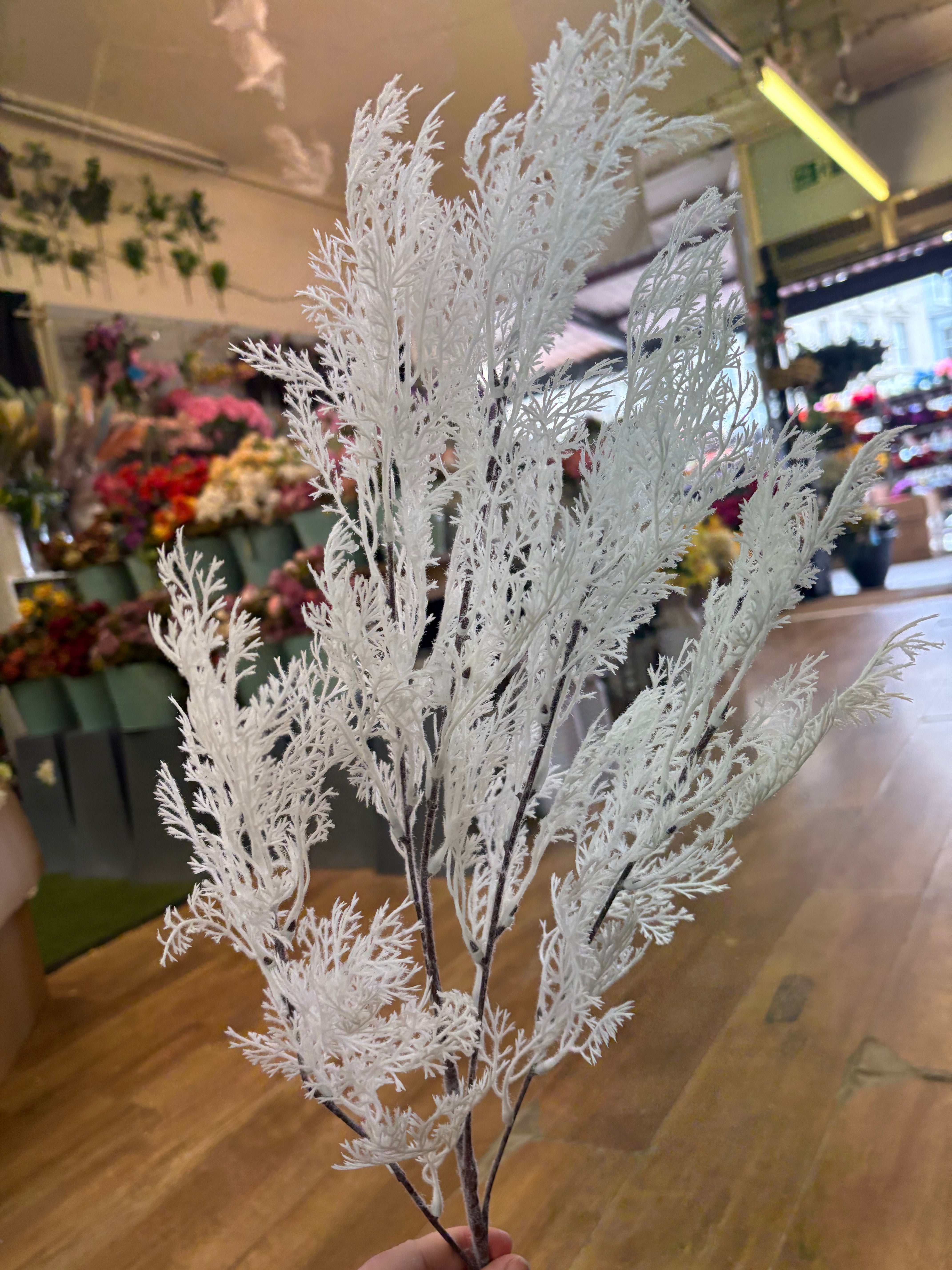 Long stem white whimsical conifer spray