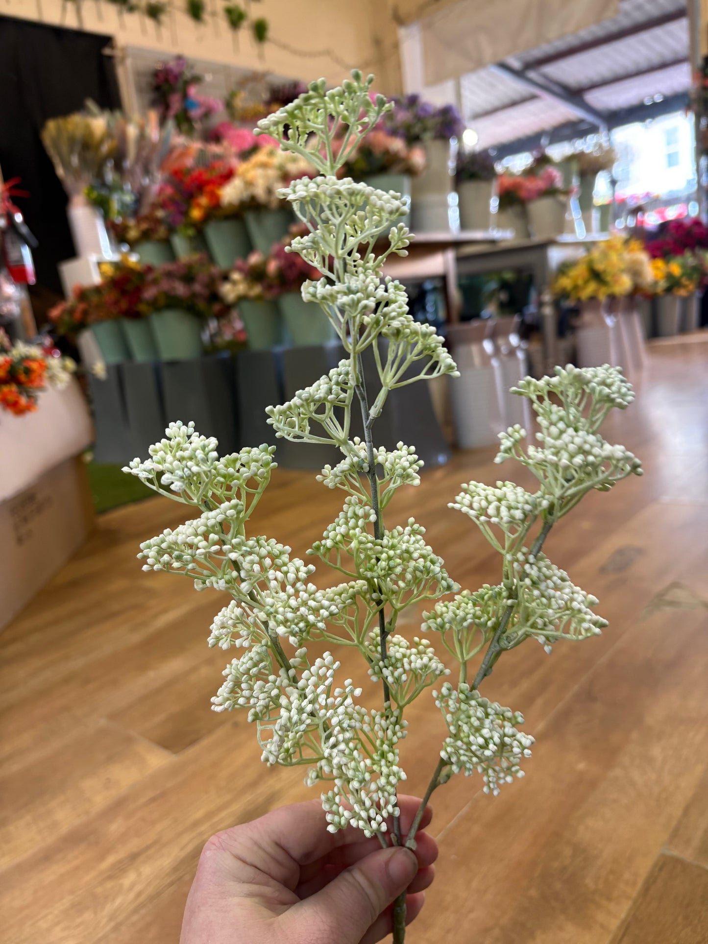 Long stem white mini bud spray