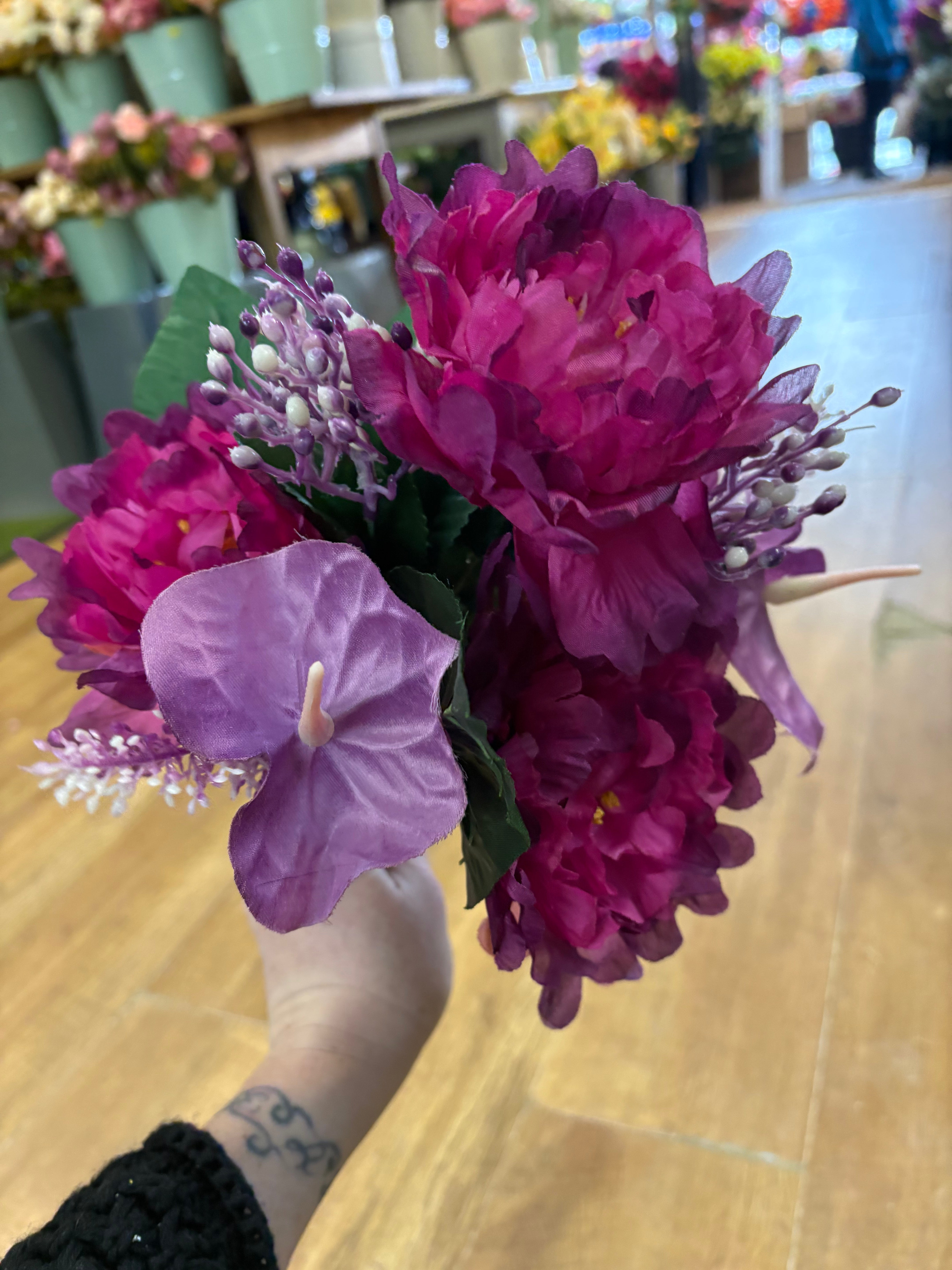 Magenta and purple frilly peony and anthurium bouquet