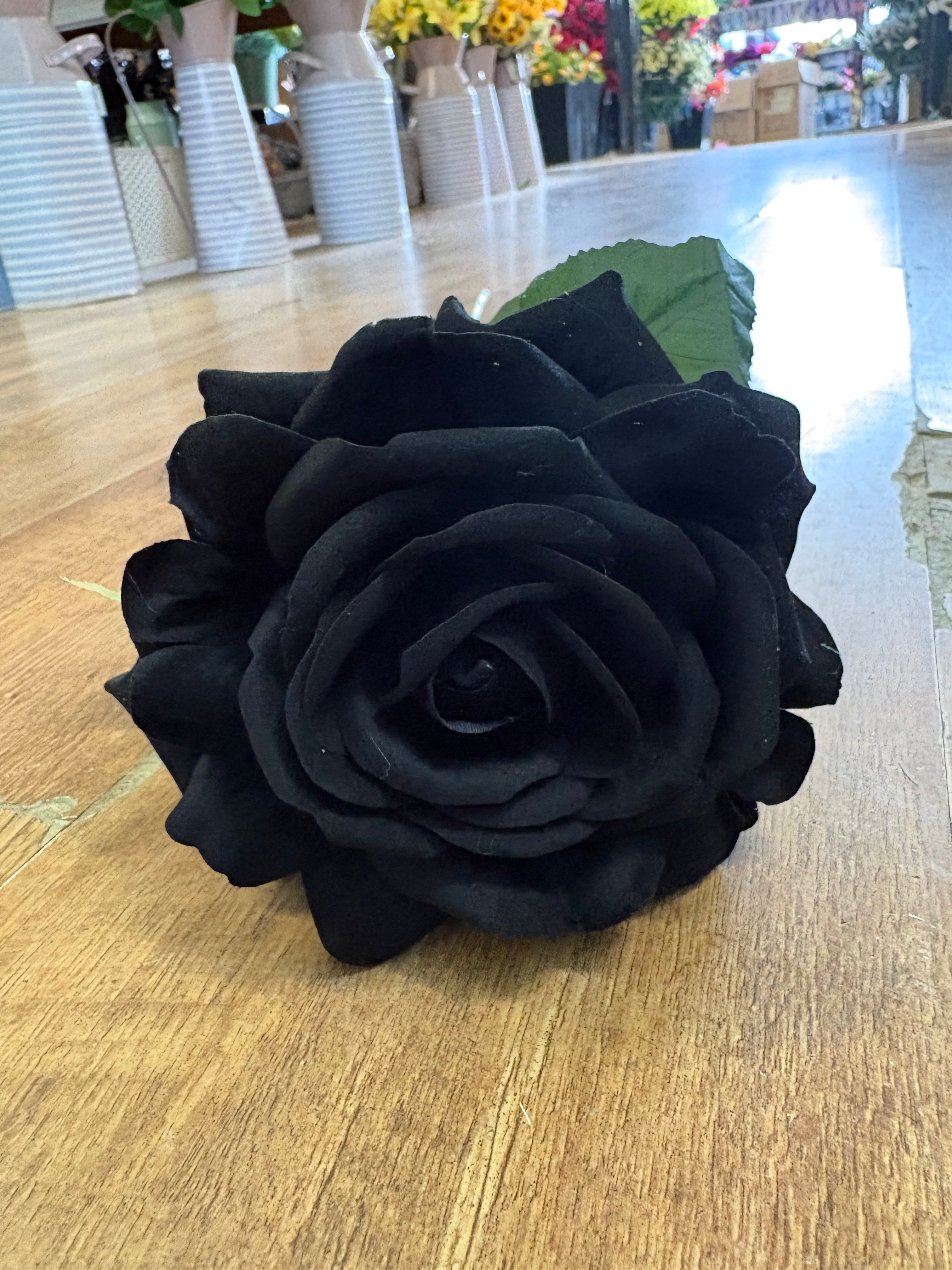 Long stem black velvet rose