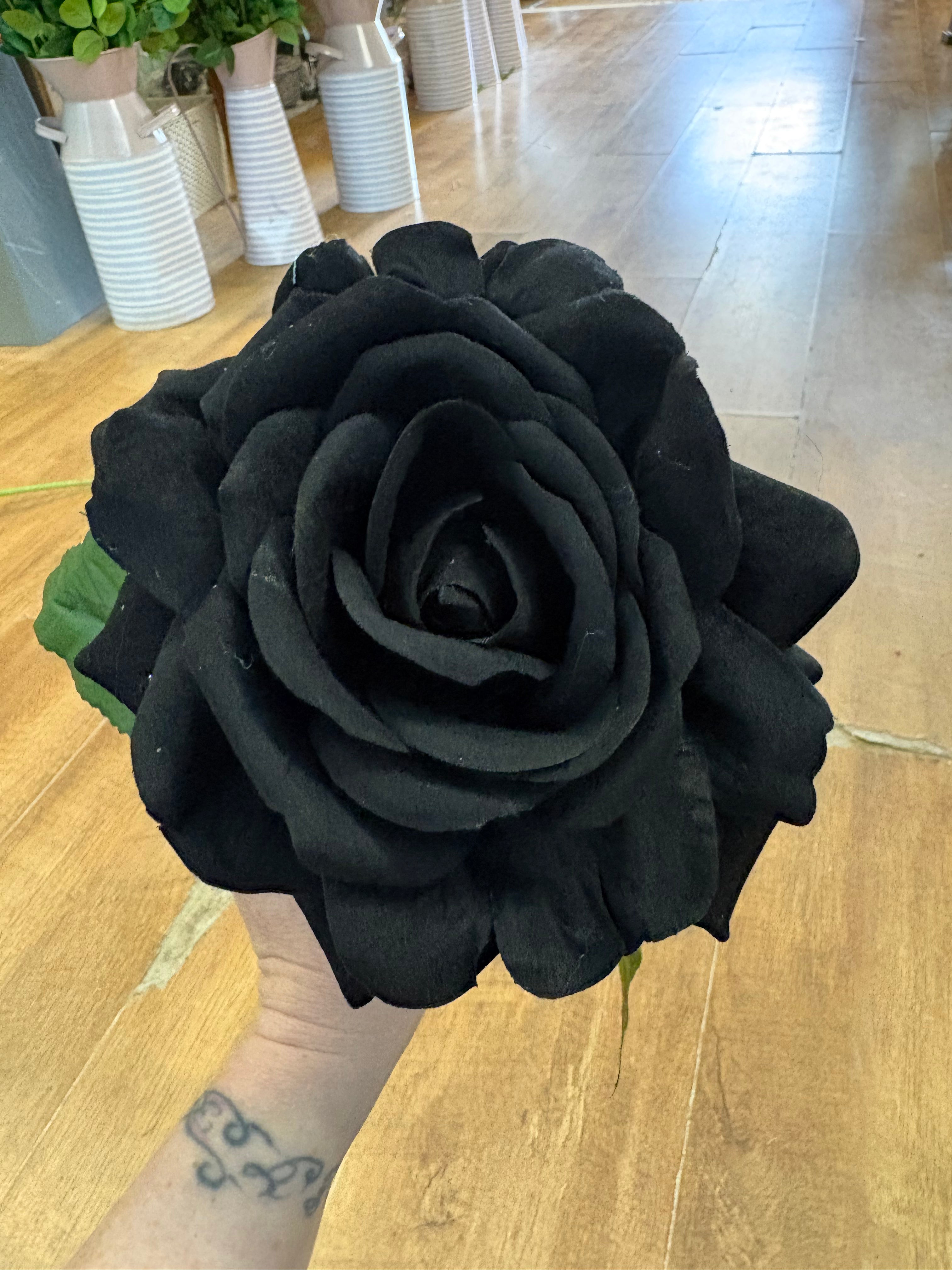 Long stem black velvet rose