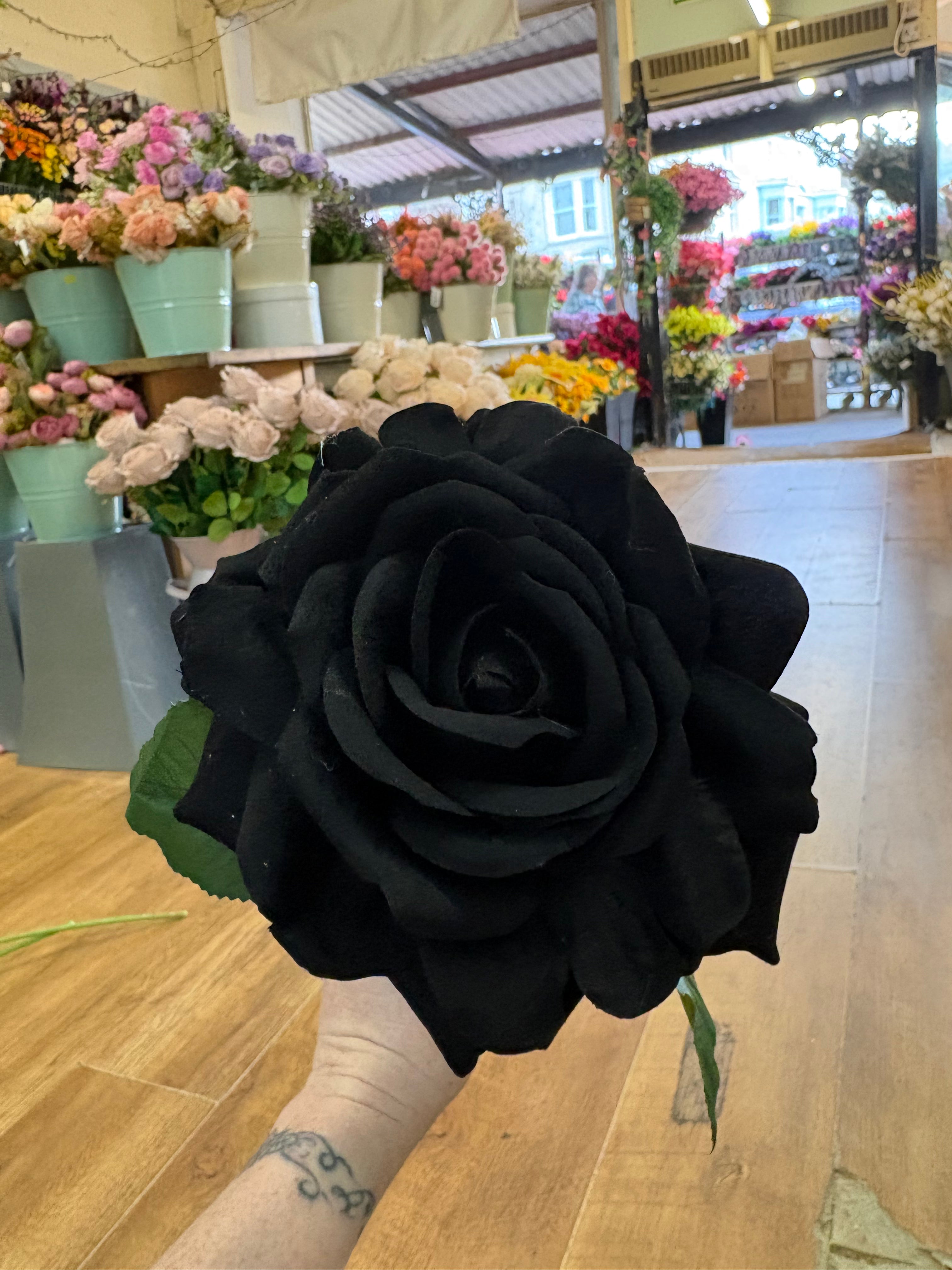 Long stem black velvet rose