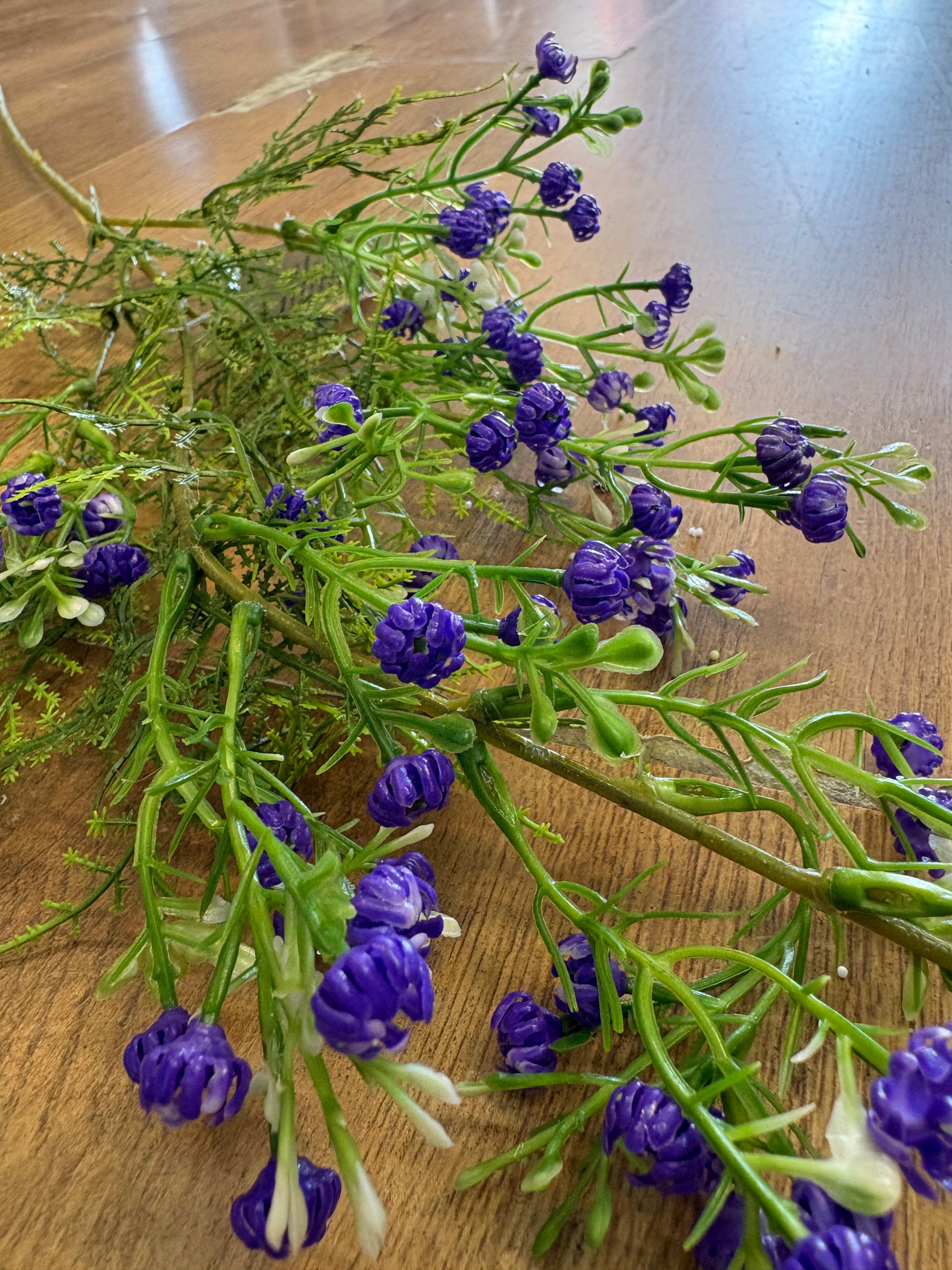 Long stem purple gypsophila and fern stem