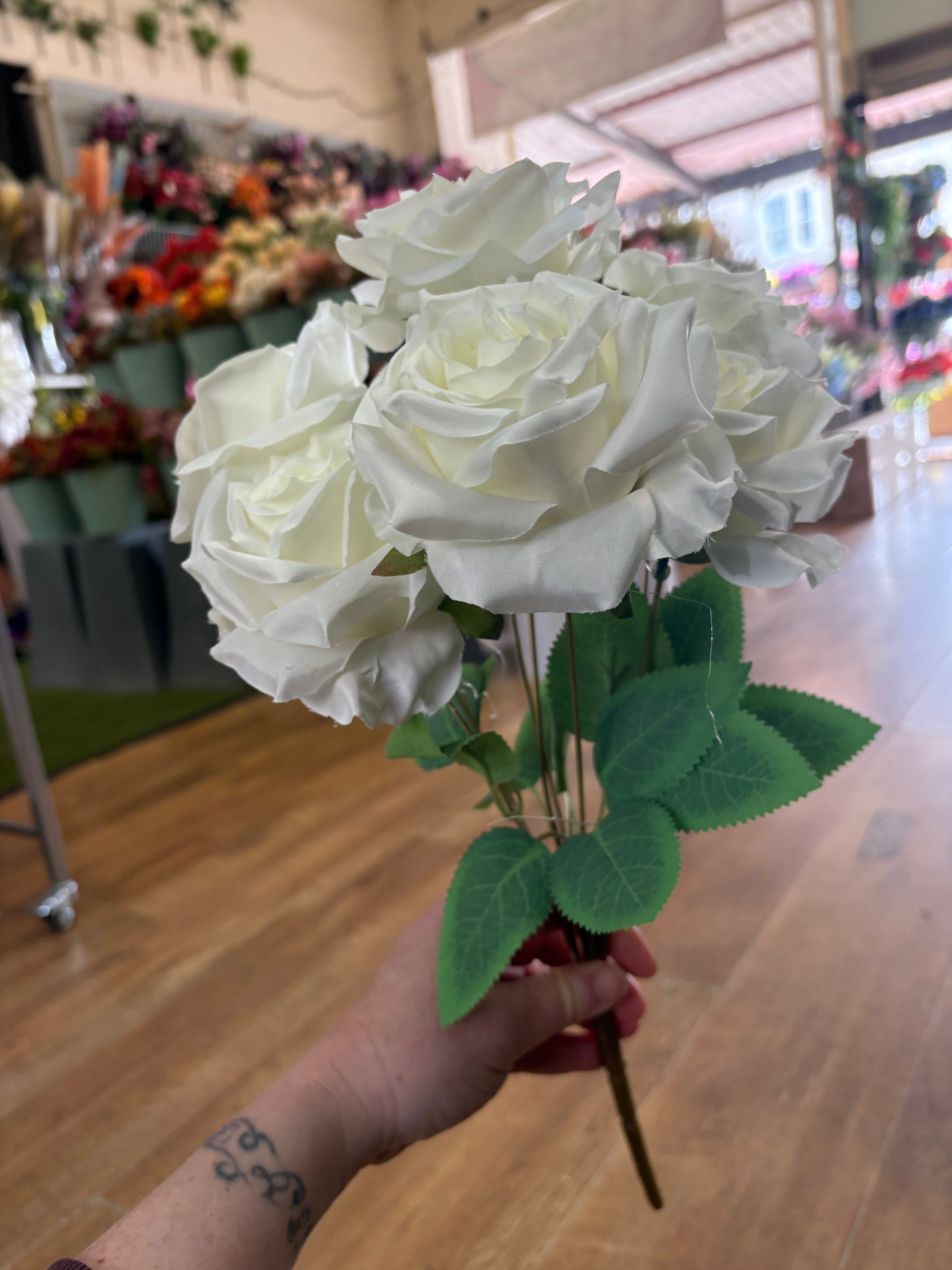 Ivory 7 headed open rose bouquet