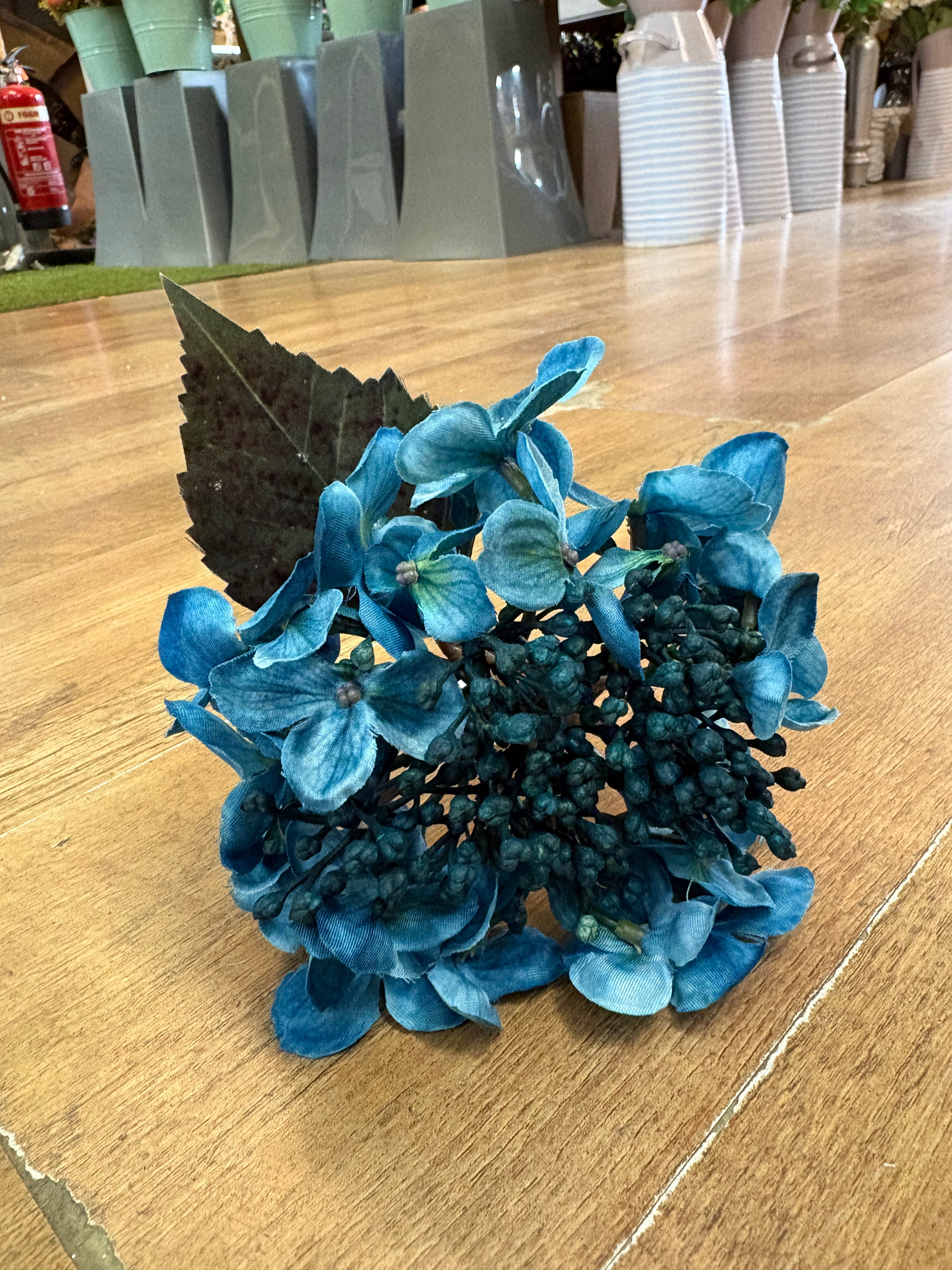 Medium length Teal budding hydrangea stem