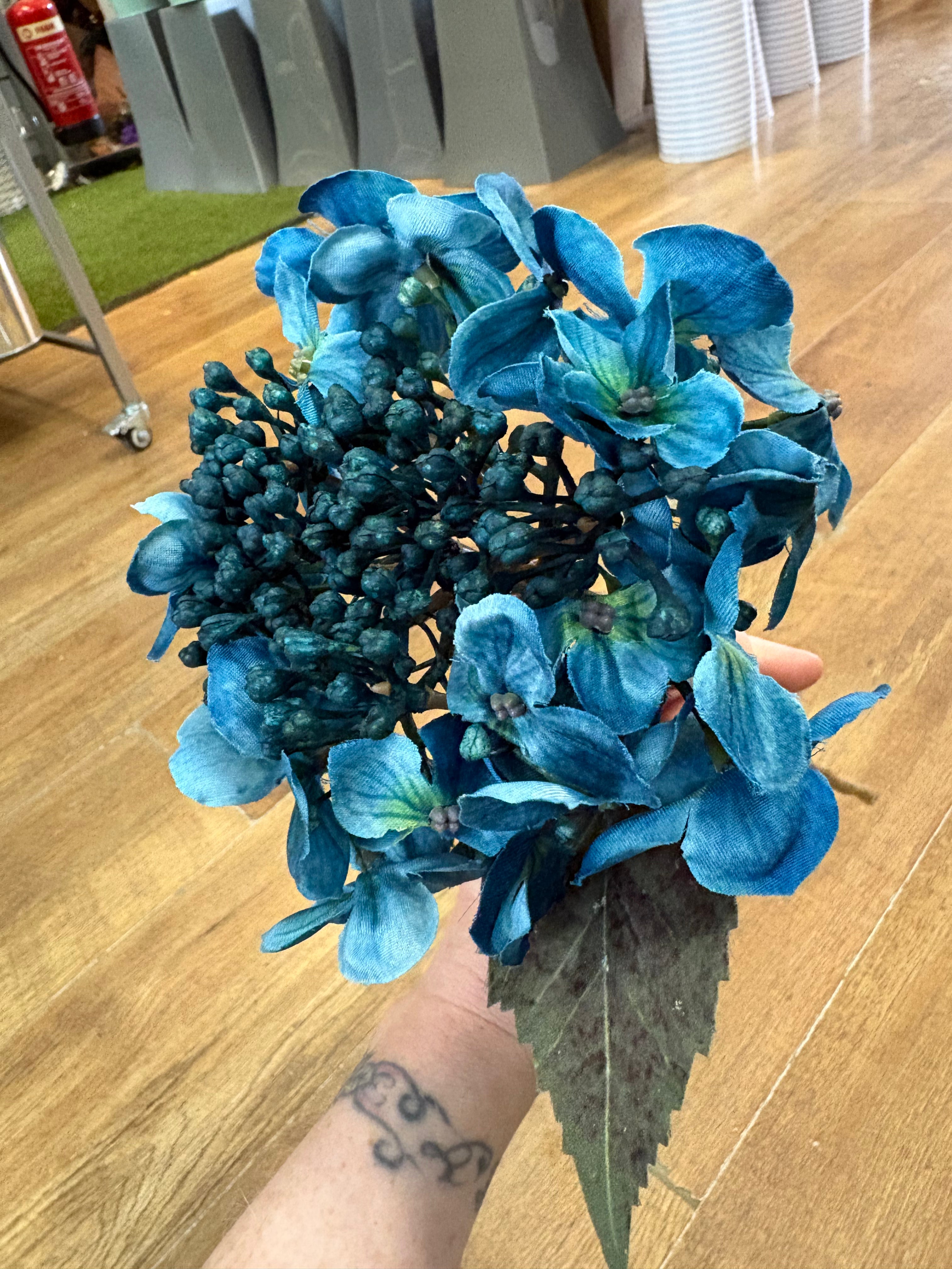 Medium length Teal budding hydrangea stem