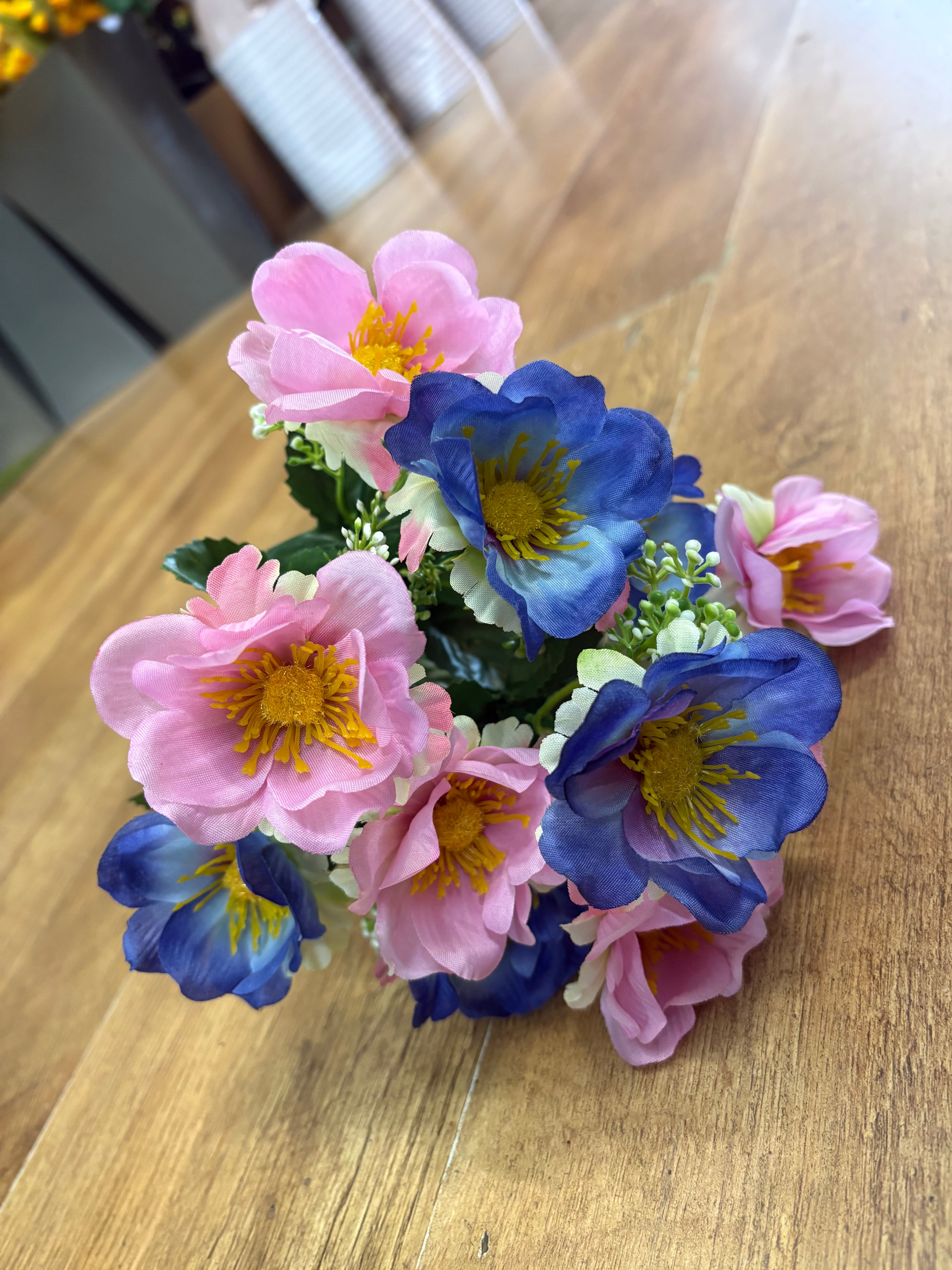 Big bunch pink and blue anemone with gypsophila
