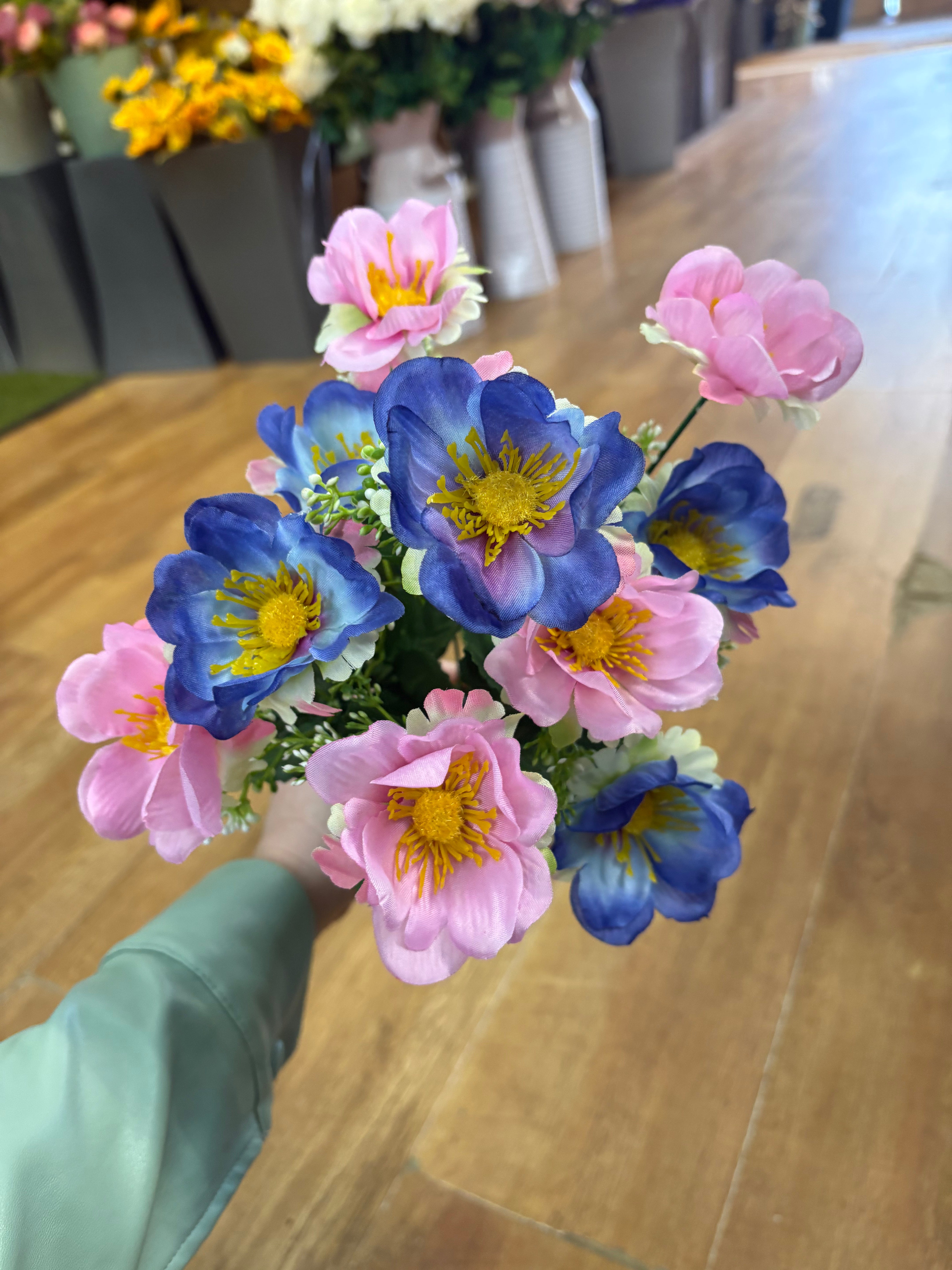 Big bunch pink and blue anemone with gypsophila