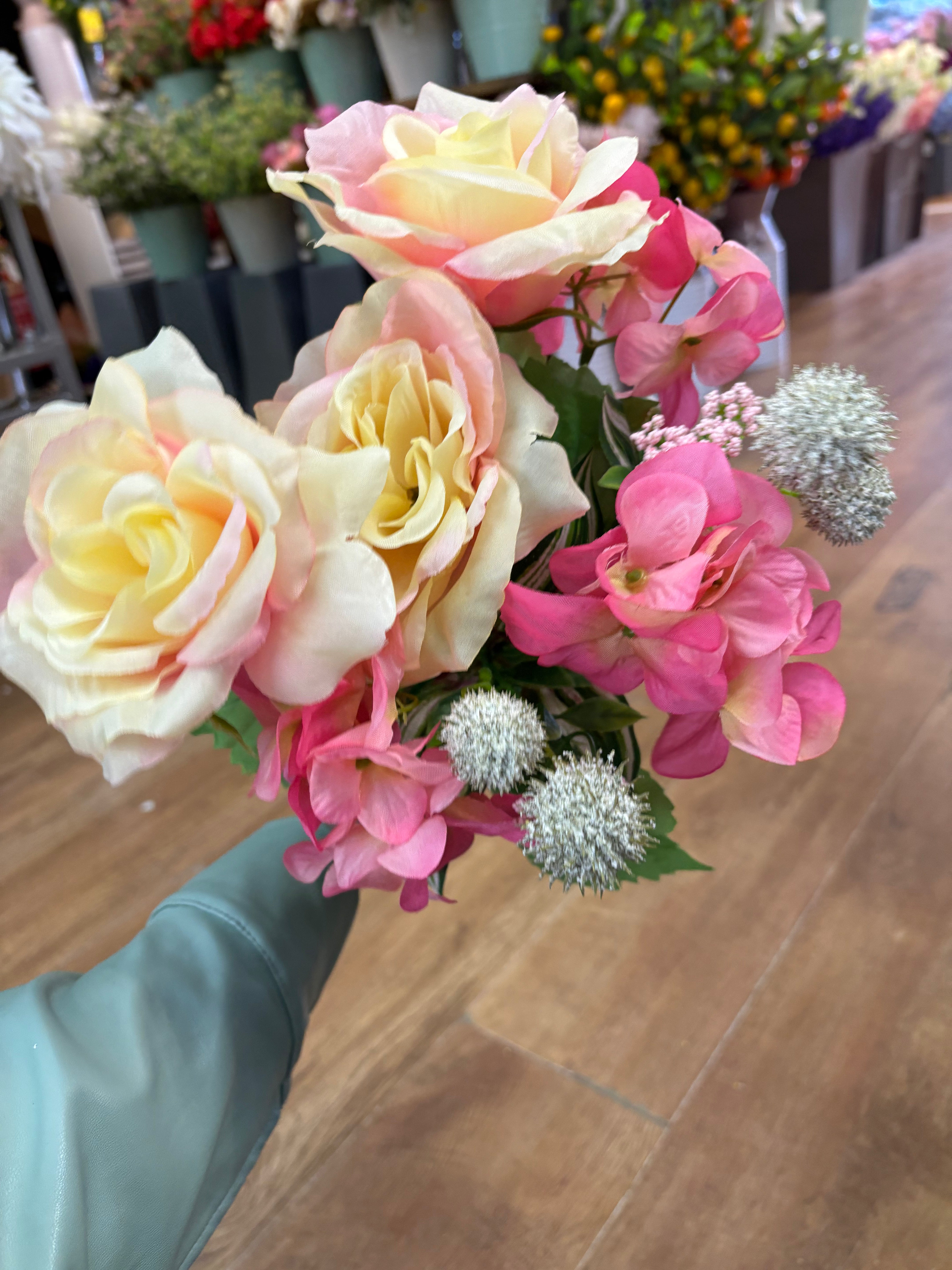 Pink and cream rose, hydrangea and mixed foliage bouquet