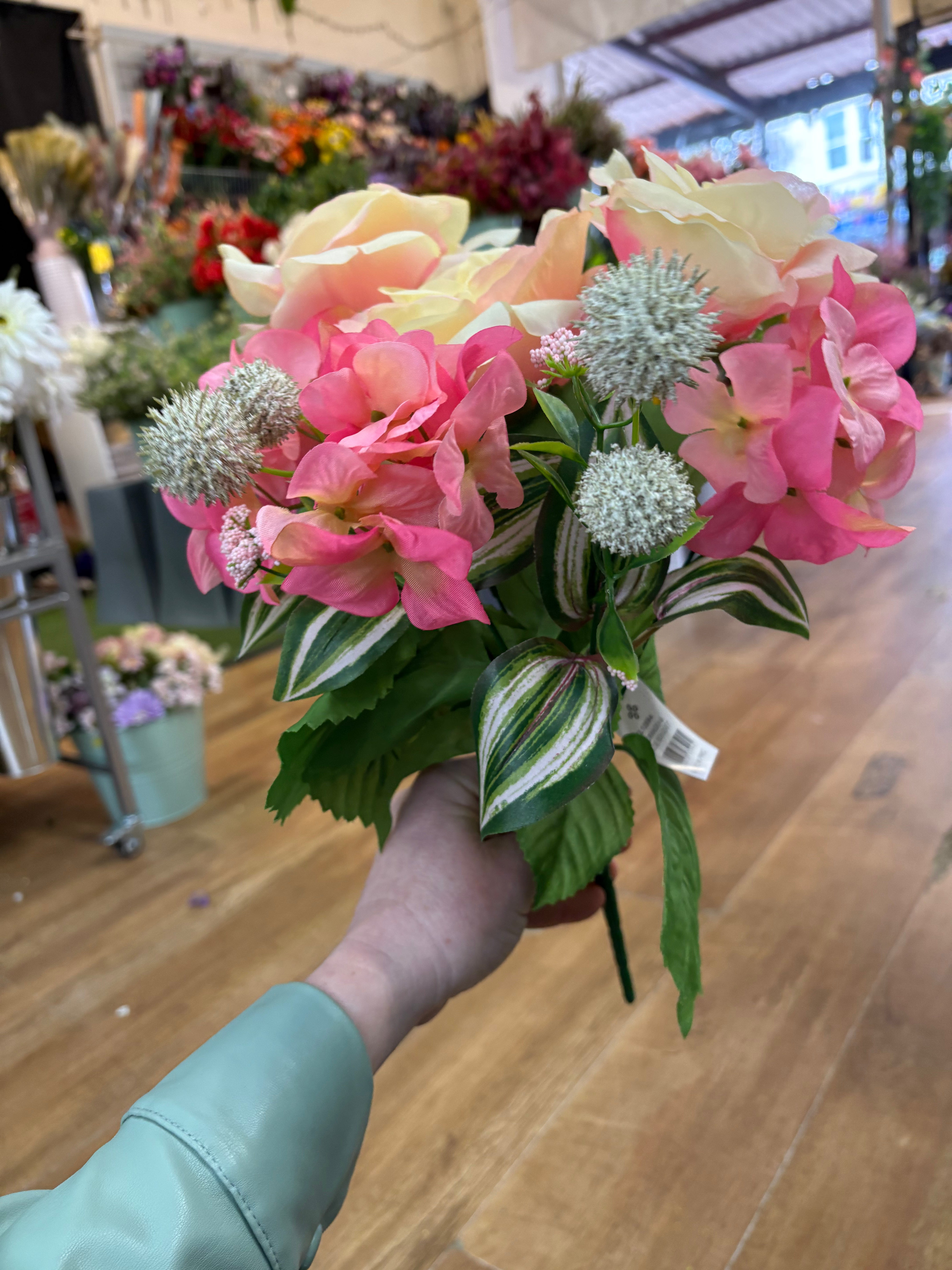 Pink and cream rose, hydrangea and mixed foliage bouquet