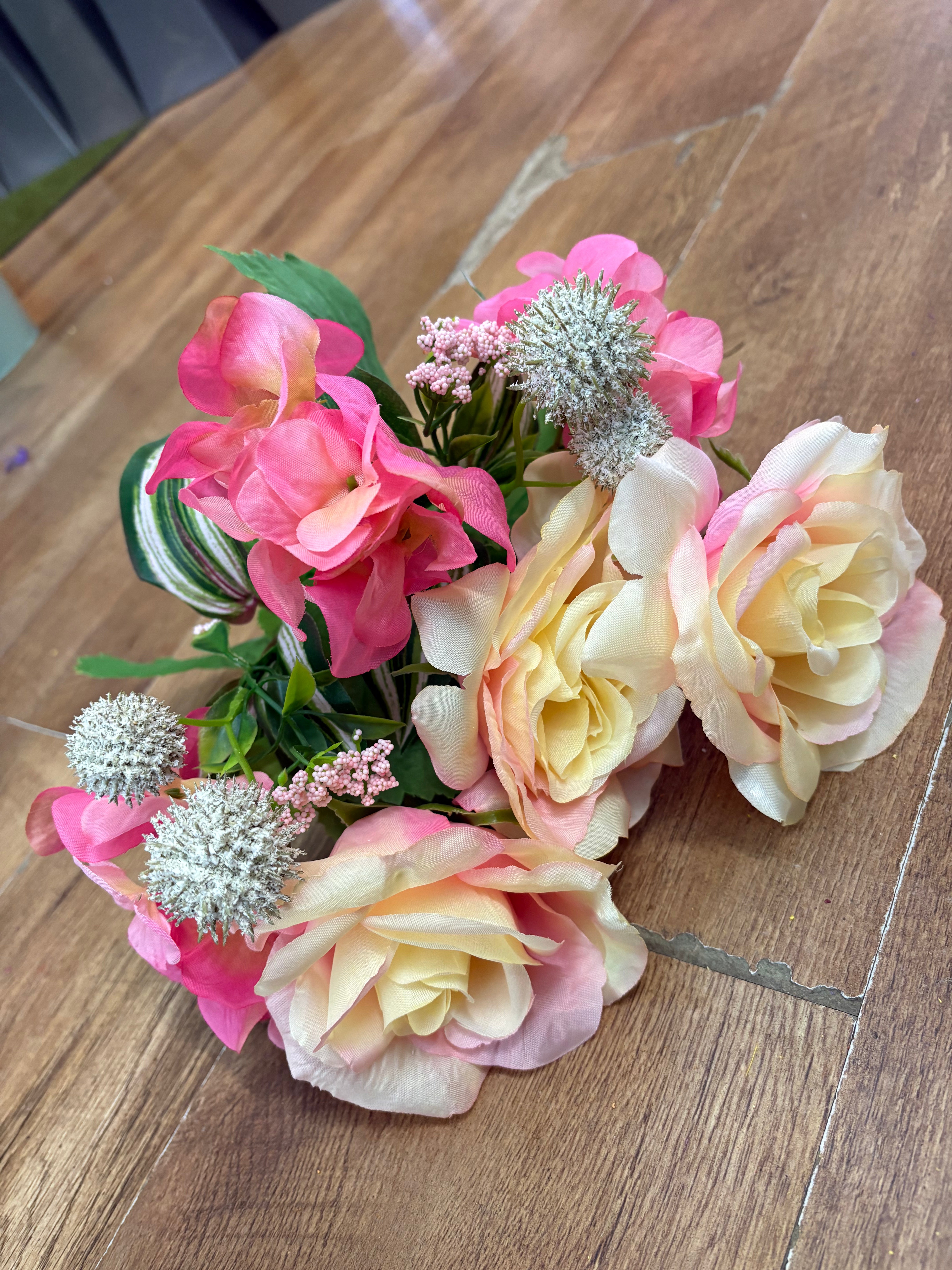 Pink and cream rose, hydrangea and mixed foliage bouquet