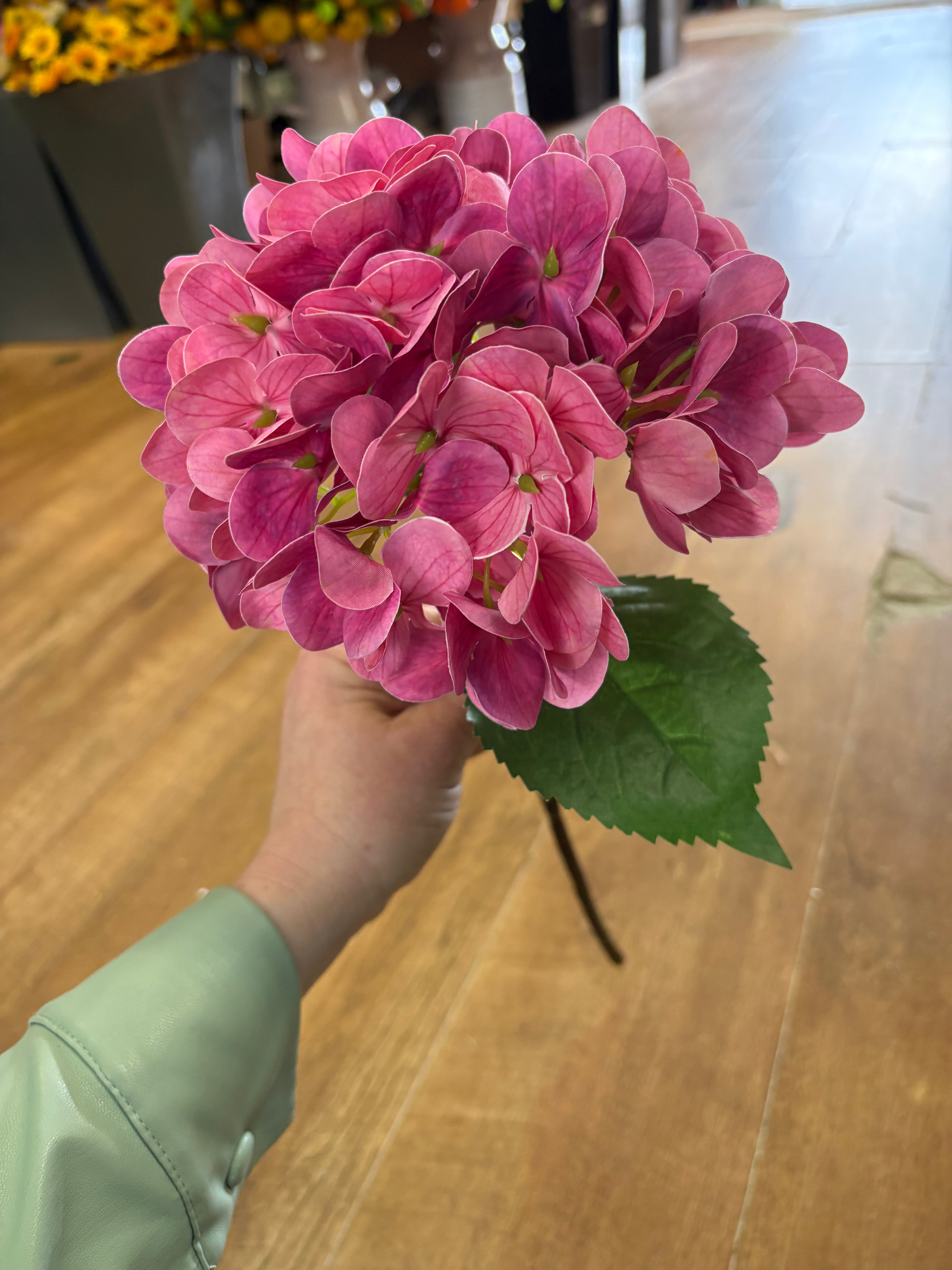 Medium length deep pink single hydrangea