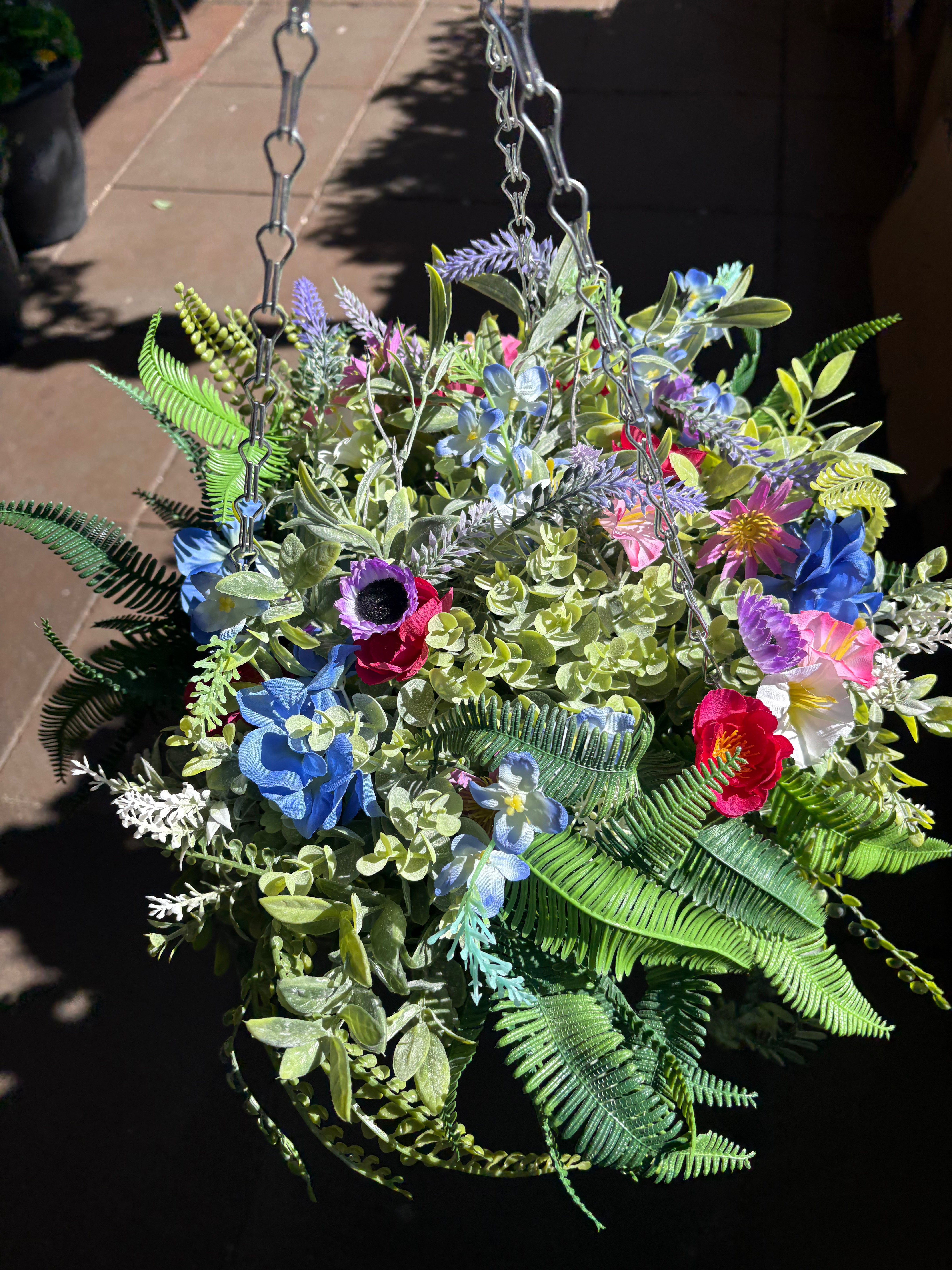 Large very full wildflower and foliage hanging basket