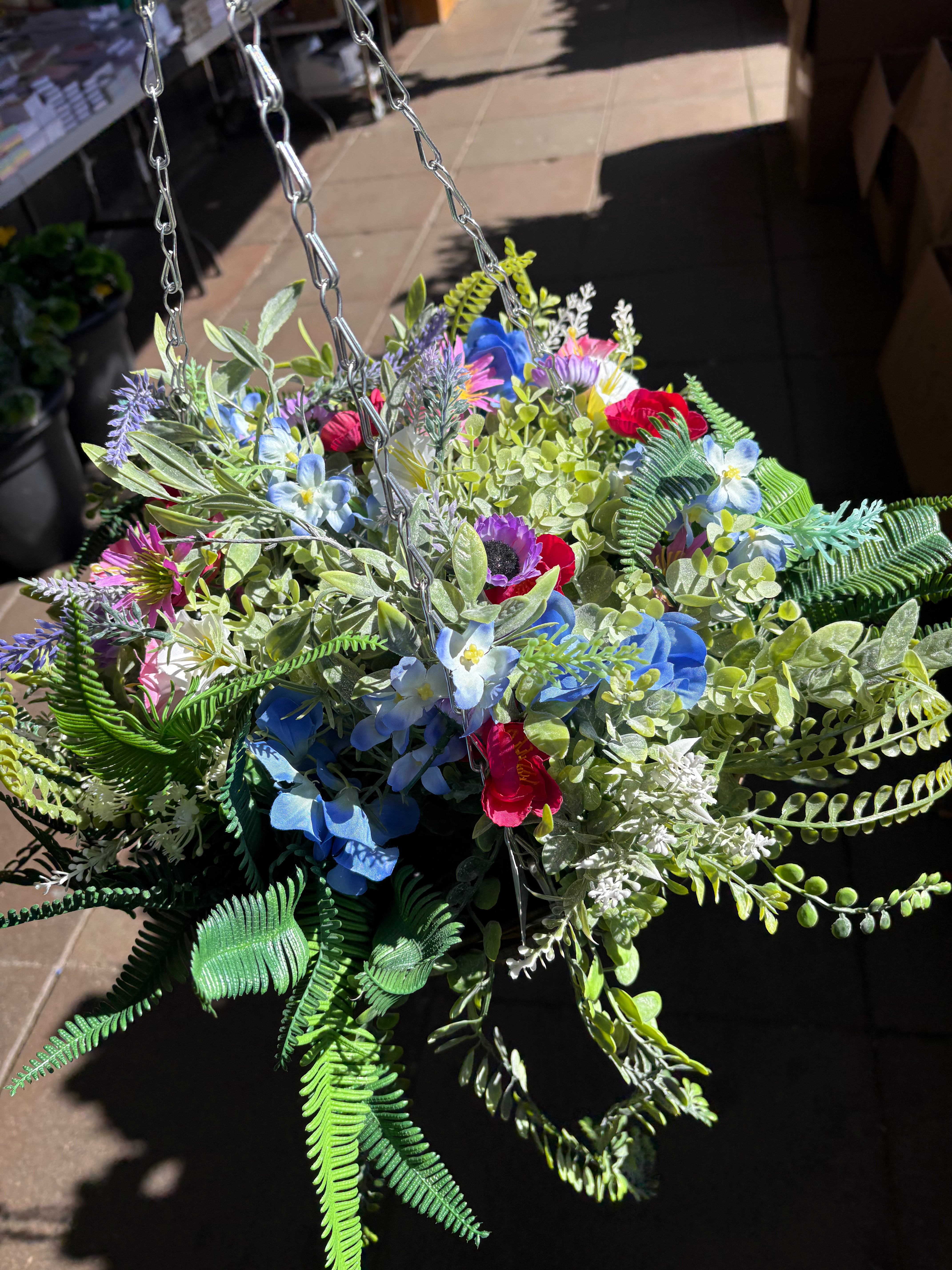 Large very full wildflower and foliage hanging basket