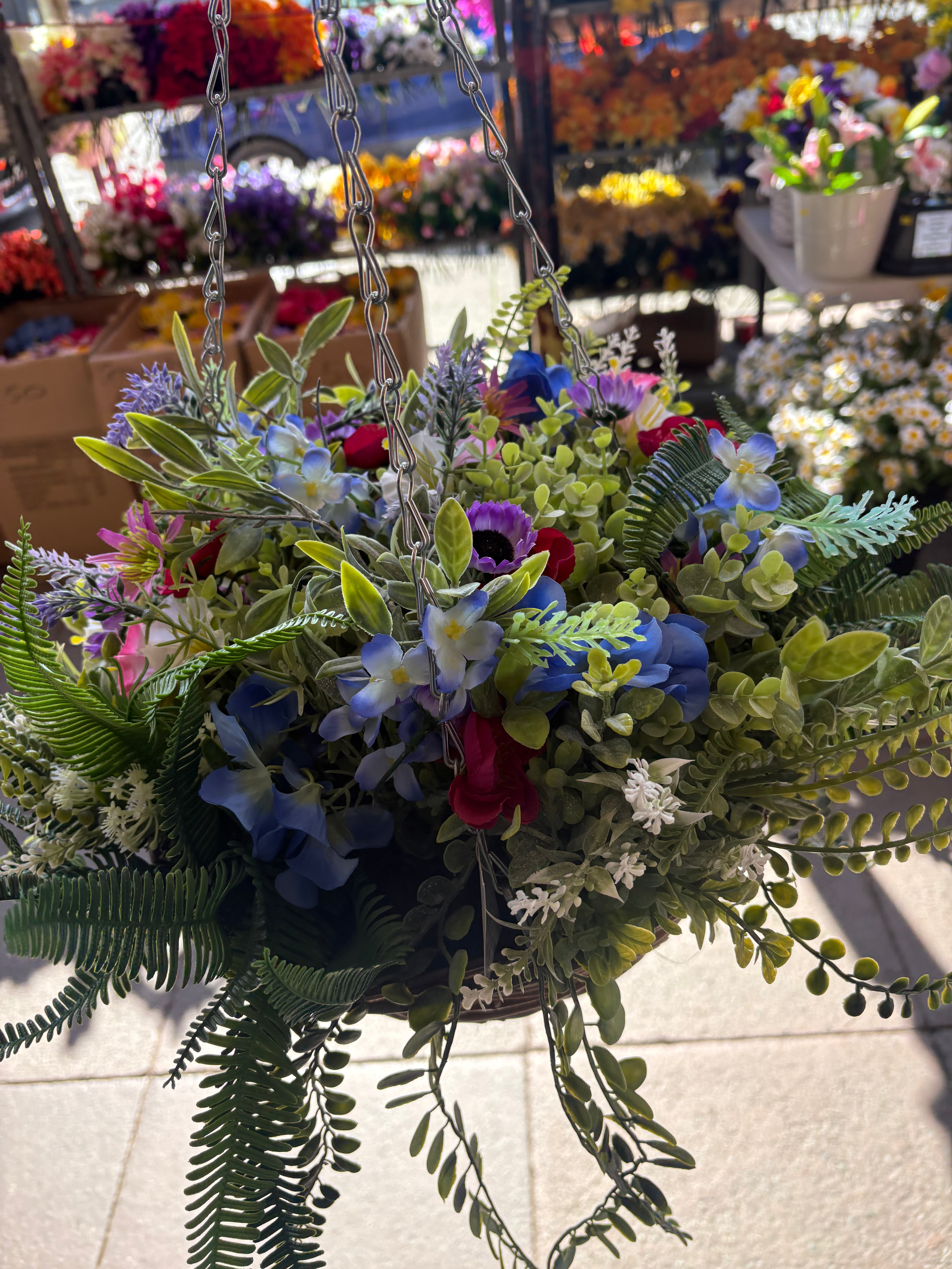 Large very full wildflower and foliage hanging basket
