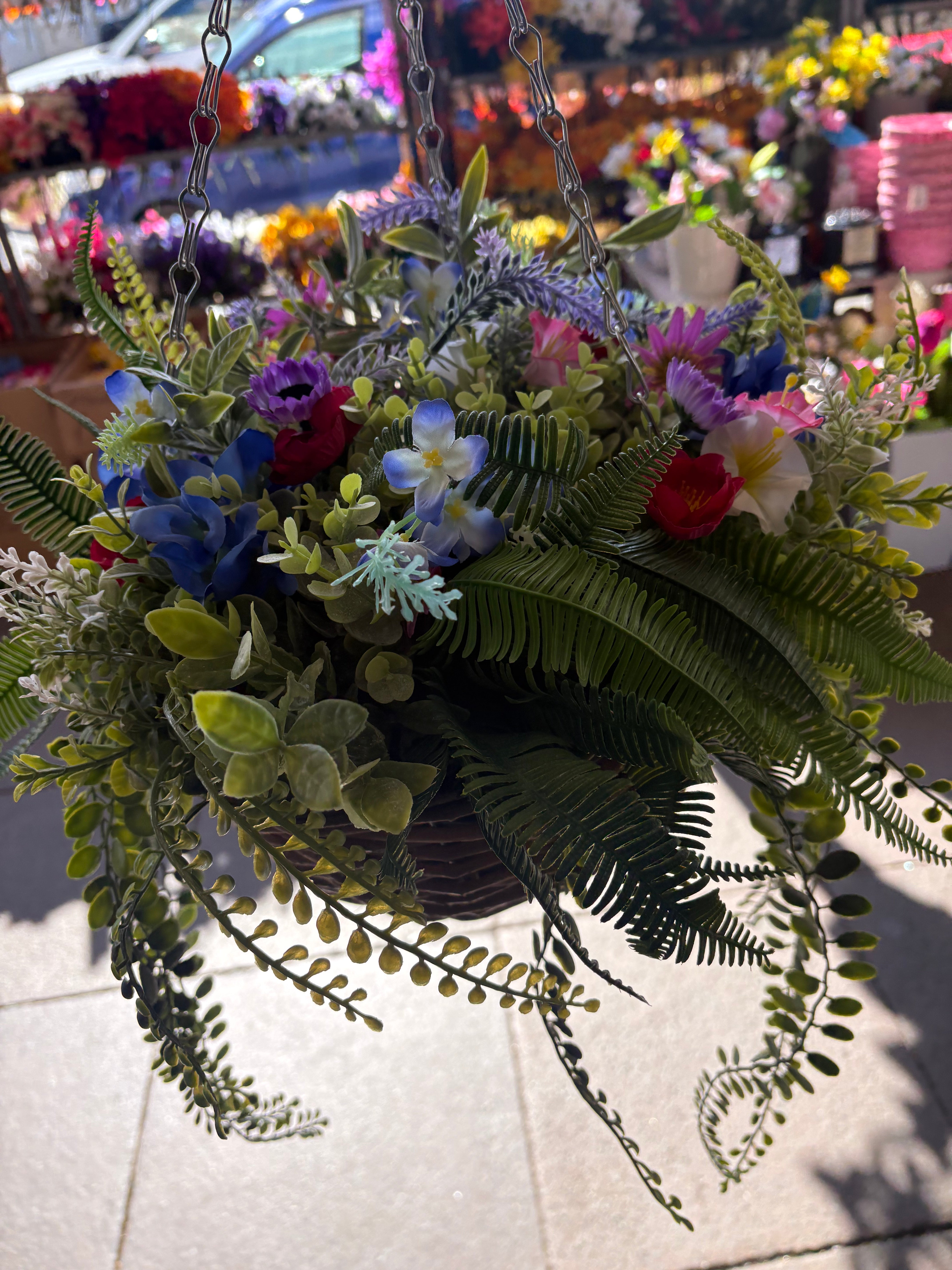Large very full wildflower and foliage hanging basket