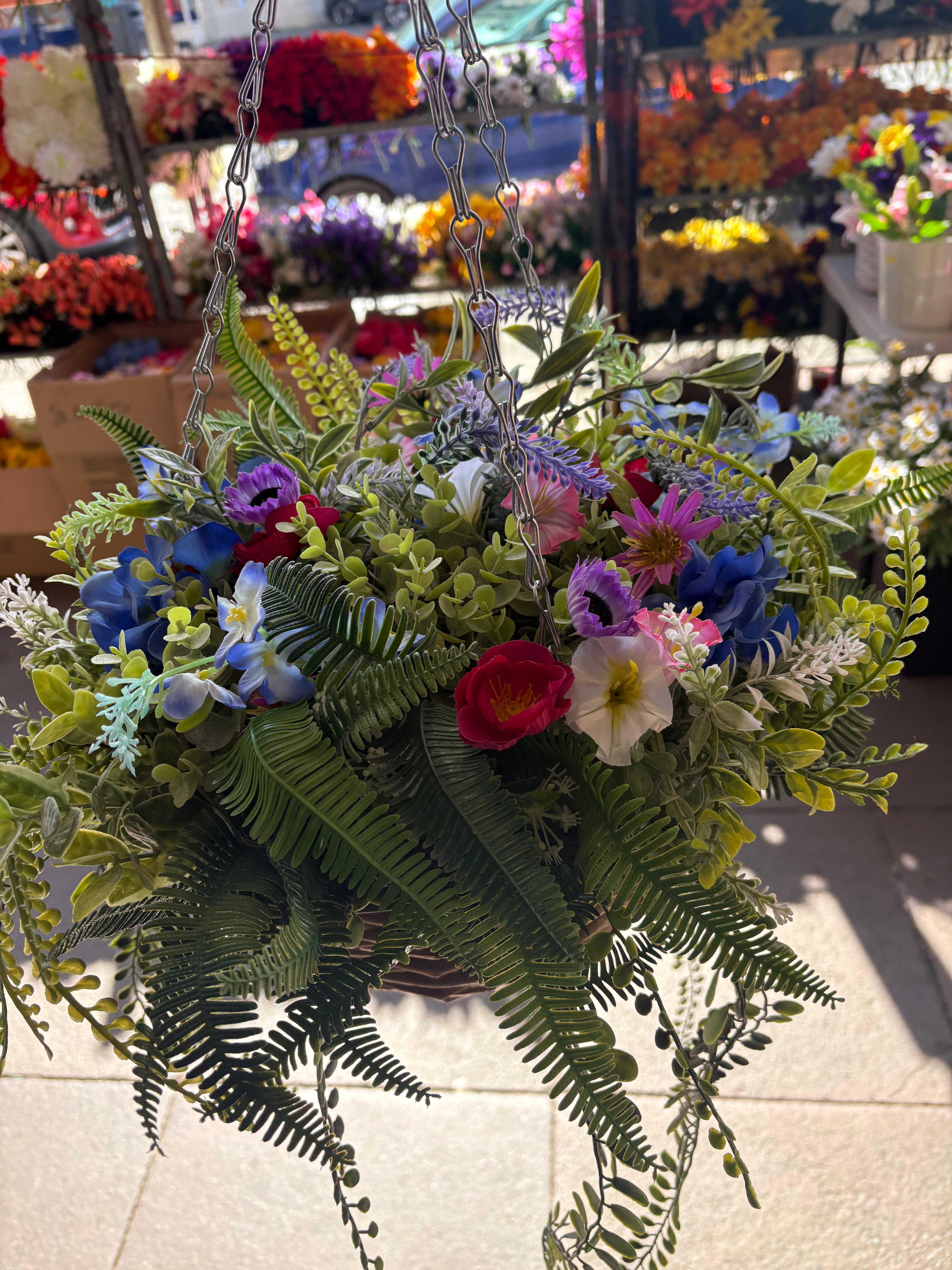 Large very full wildflower and foliage hanging basket