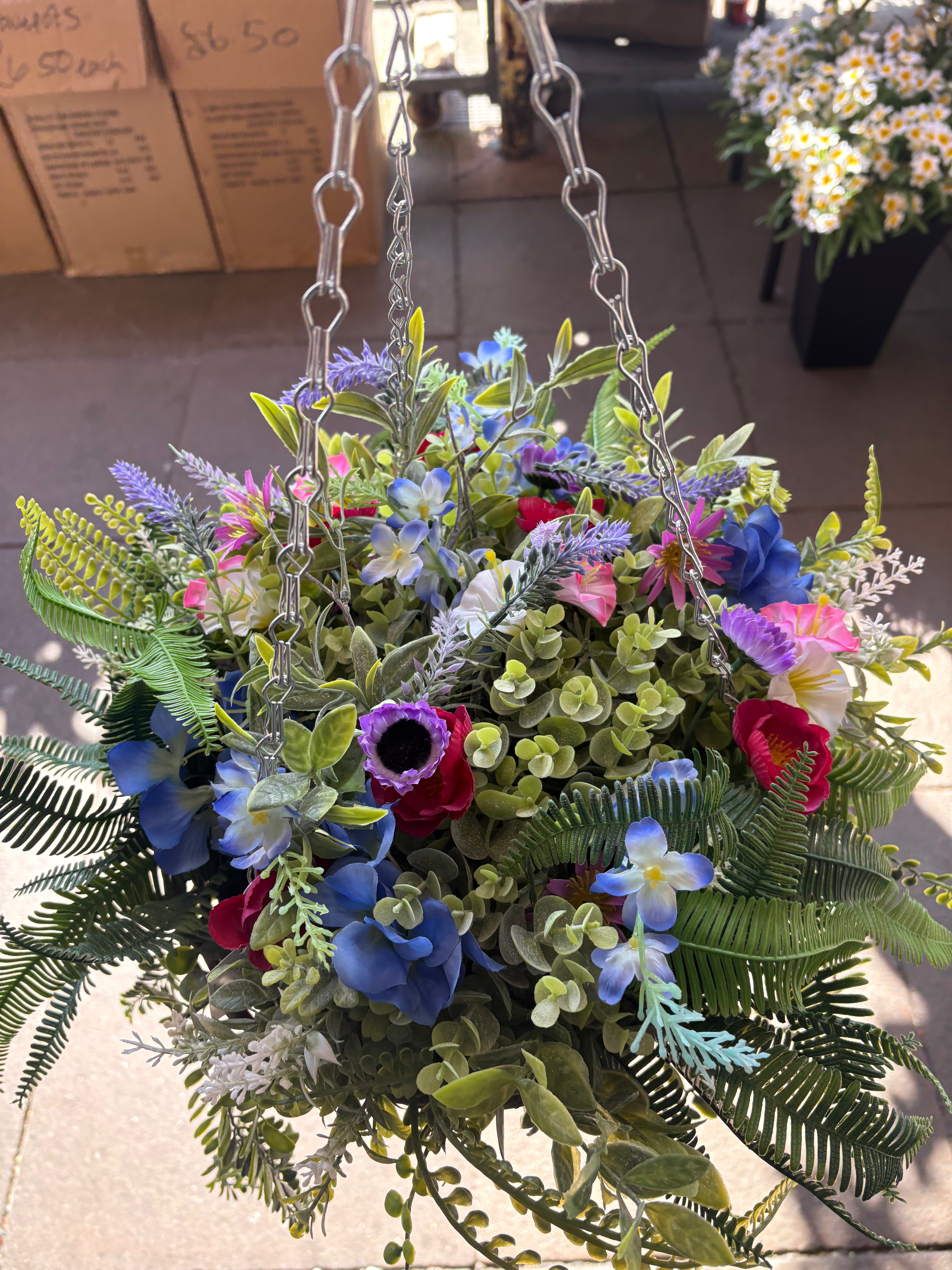 Large very full wildflower and foliage hanging basket