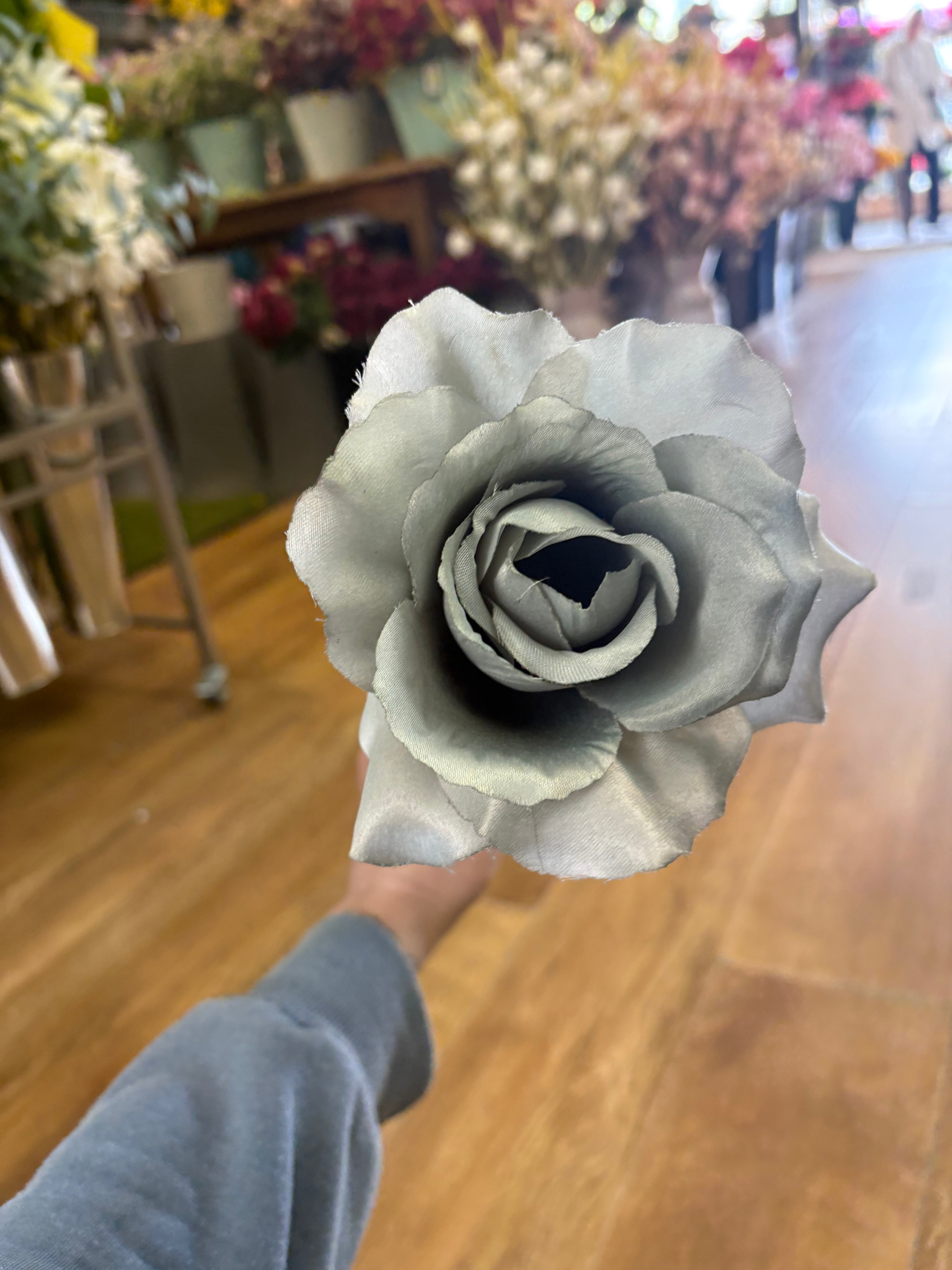 Long stem grey open rose