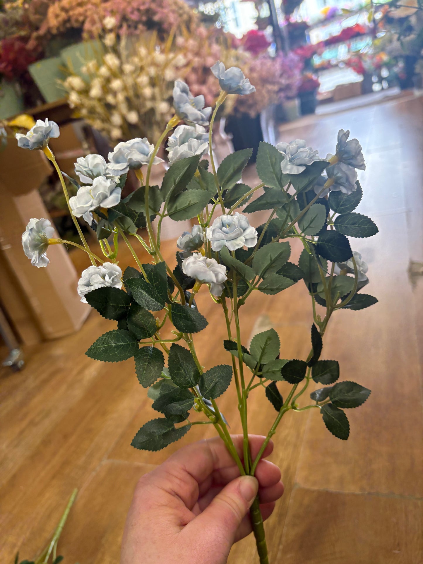 Pale blue ruffled buttercup bunch