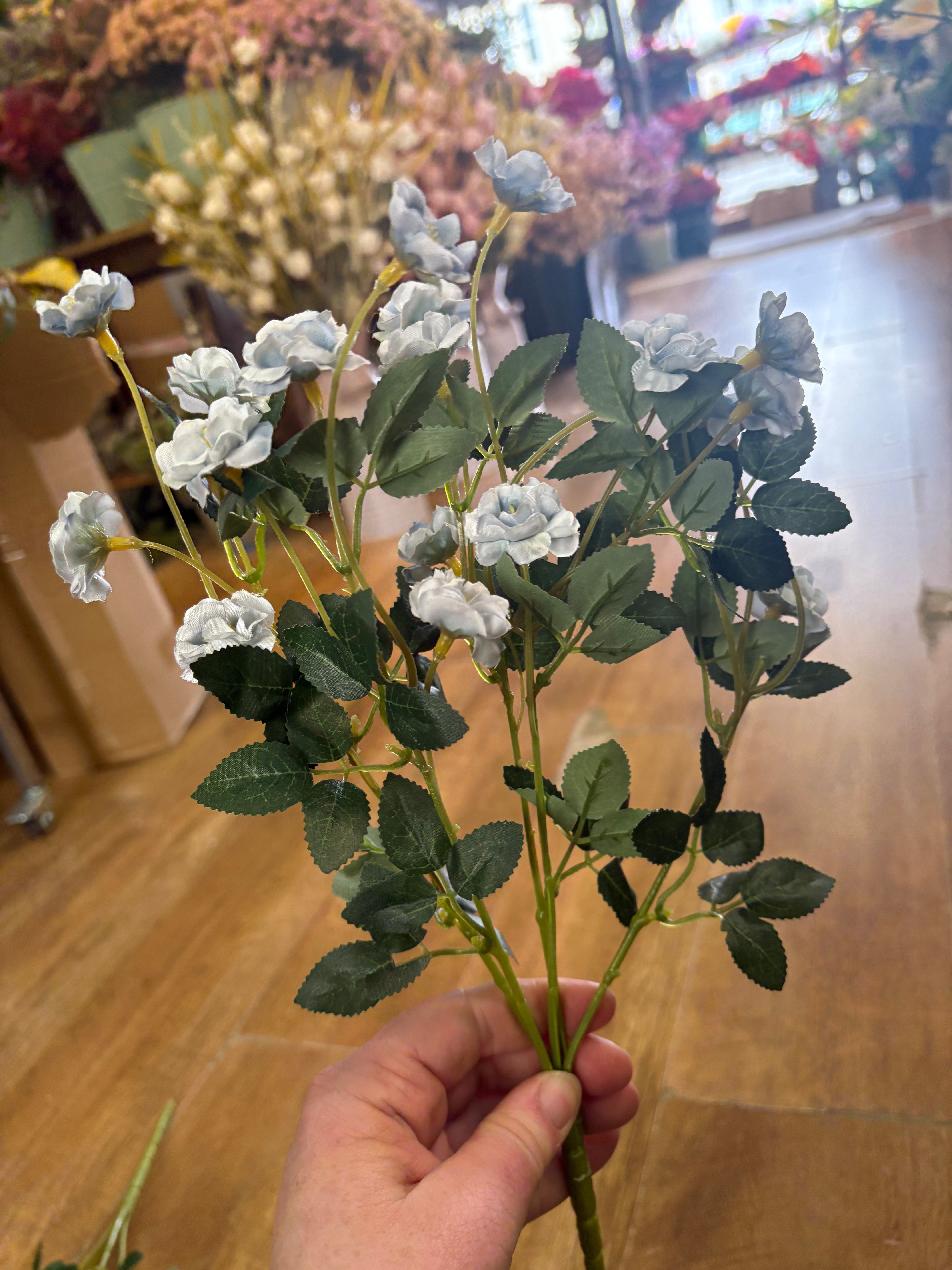 Pale blue ruffled buttercup bunch