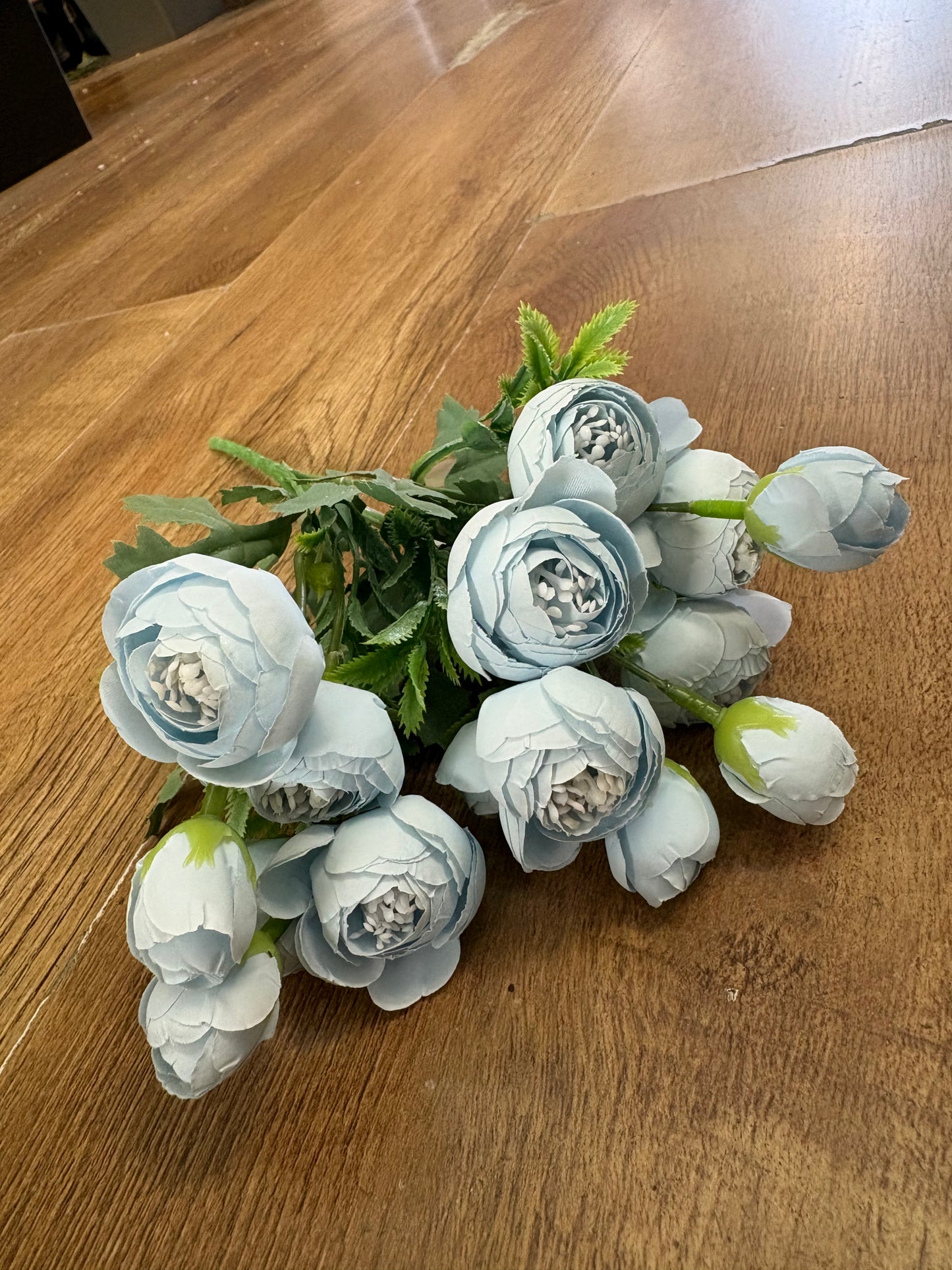 Small soft blue closed peony bunch