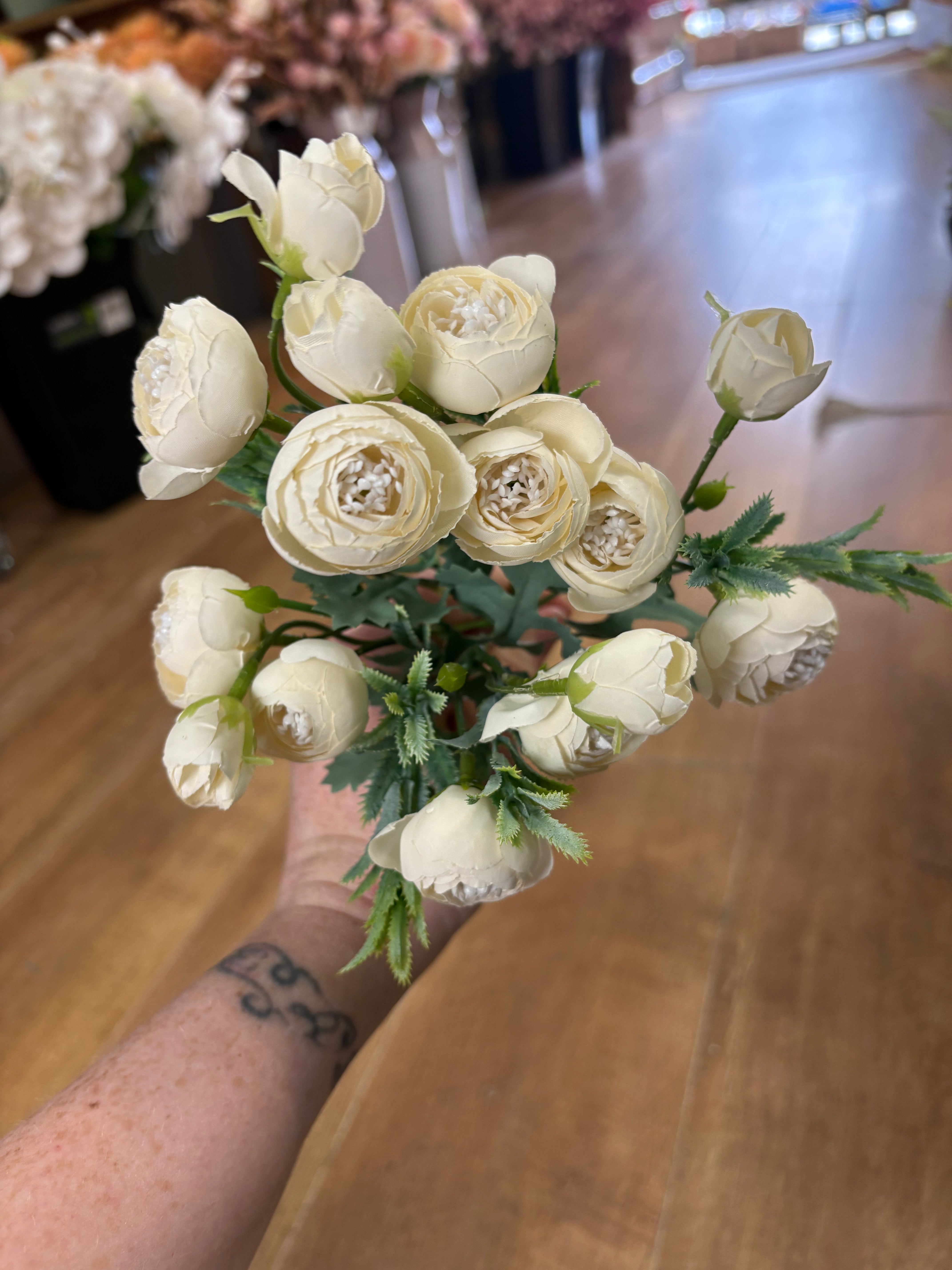 Small cream closed peony bunch