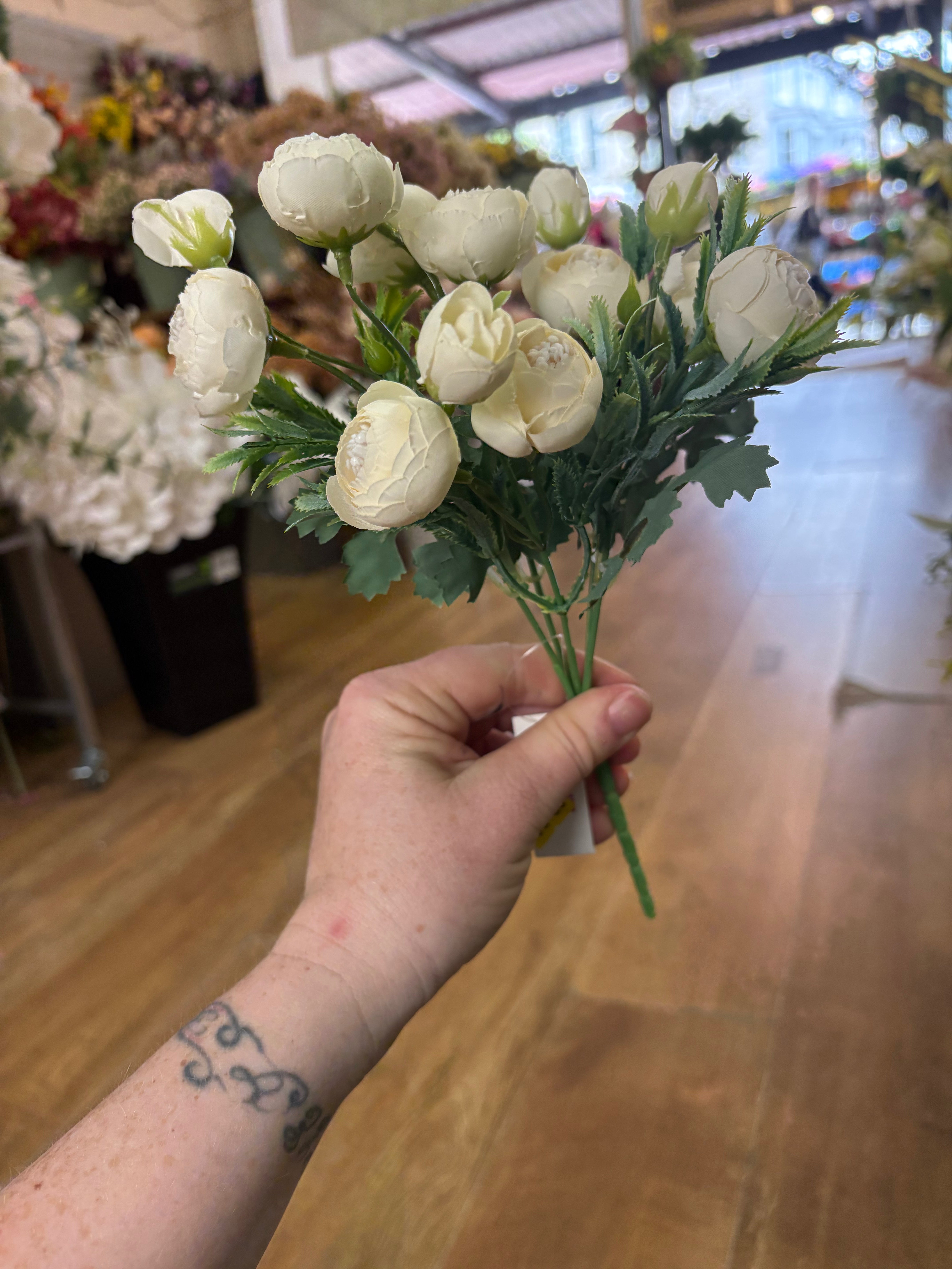 Small cream closed peony bunch