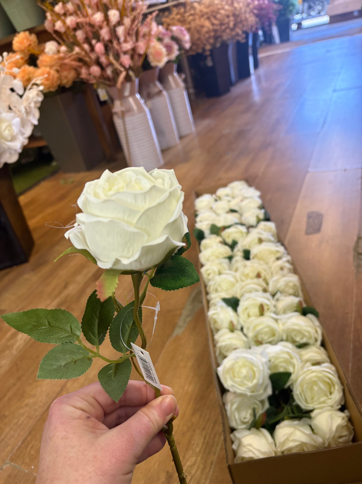 Box of 48 ivory globe roses (approx 8/9cm head)
