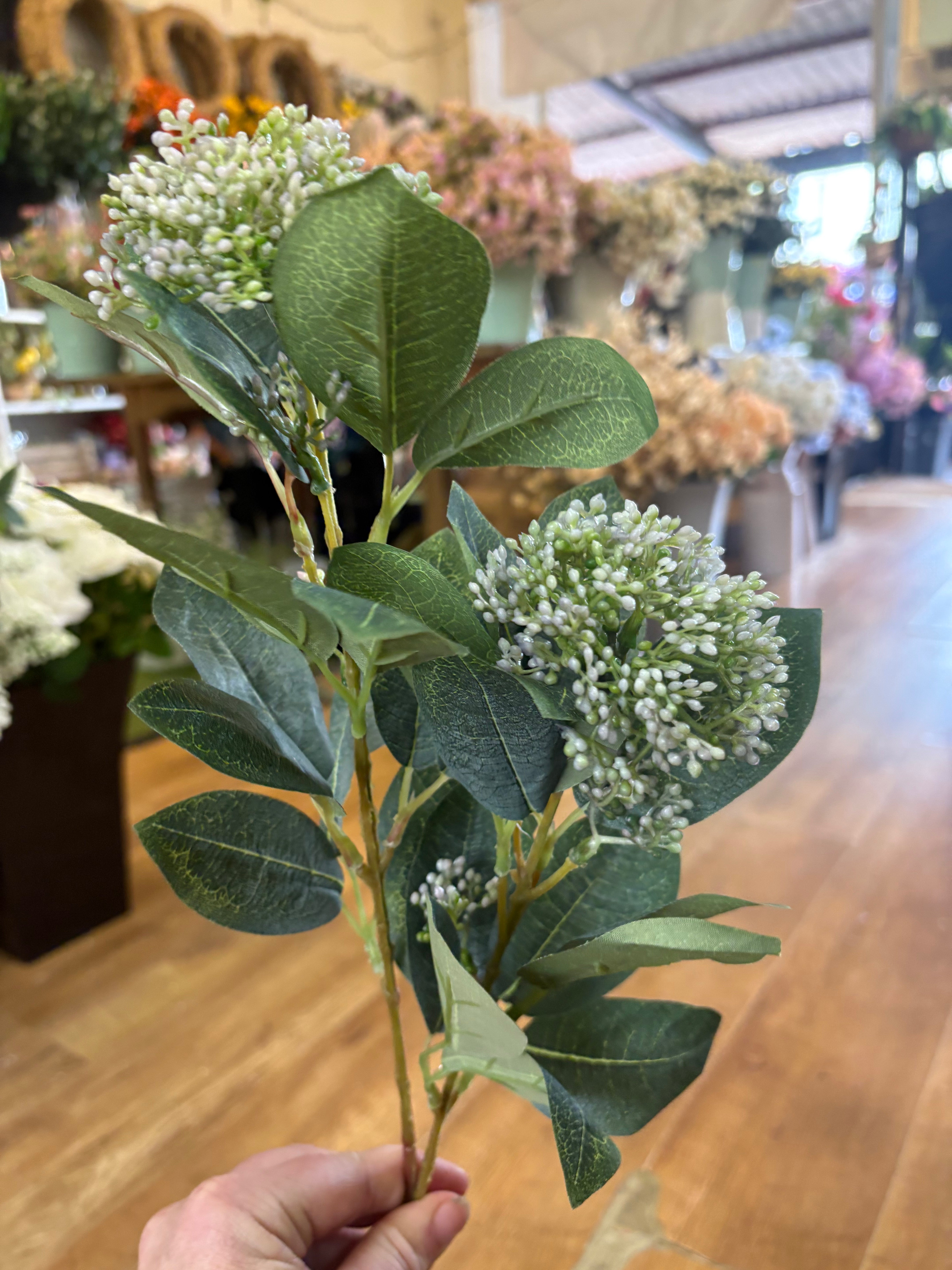 Long stem lilac tinted bushy viburnum spray