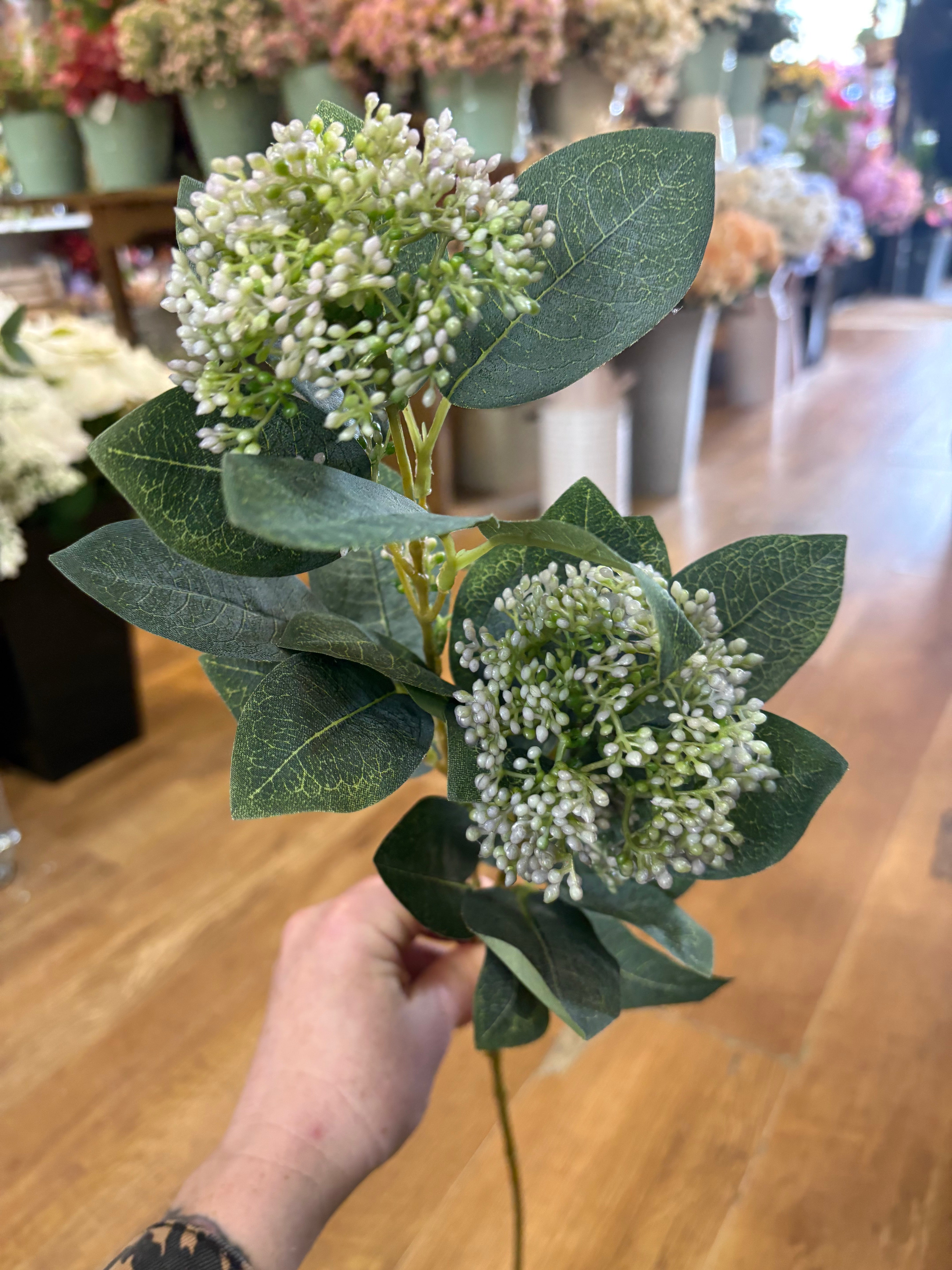 Long stem lilac tinted bushy viburnum spray